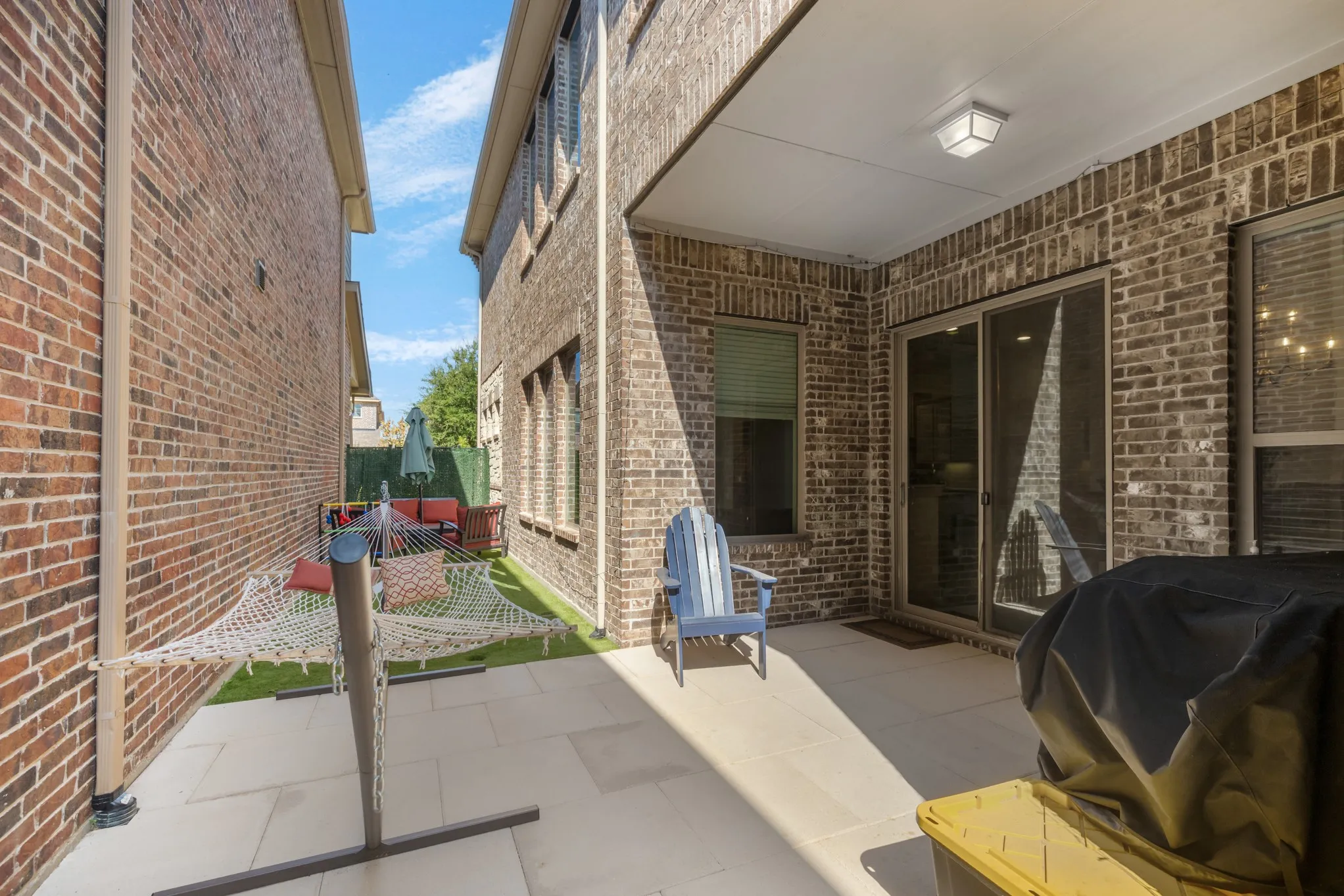 A mixture of Turf and pavestones make an excellent outdoor area