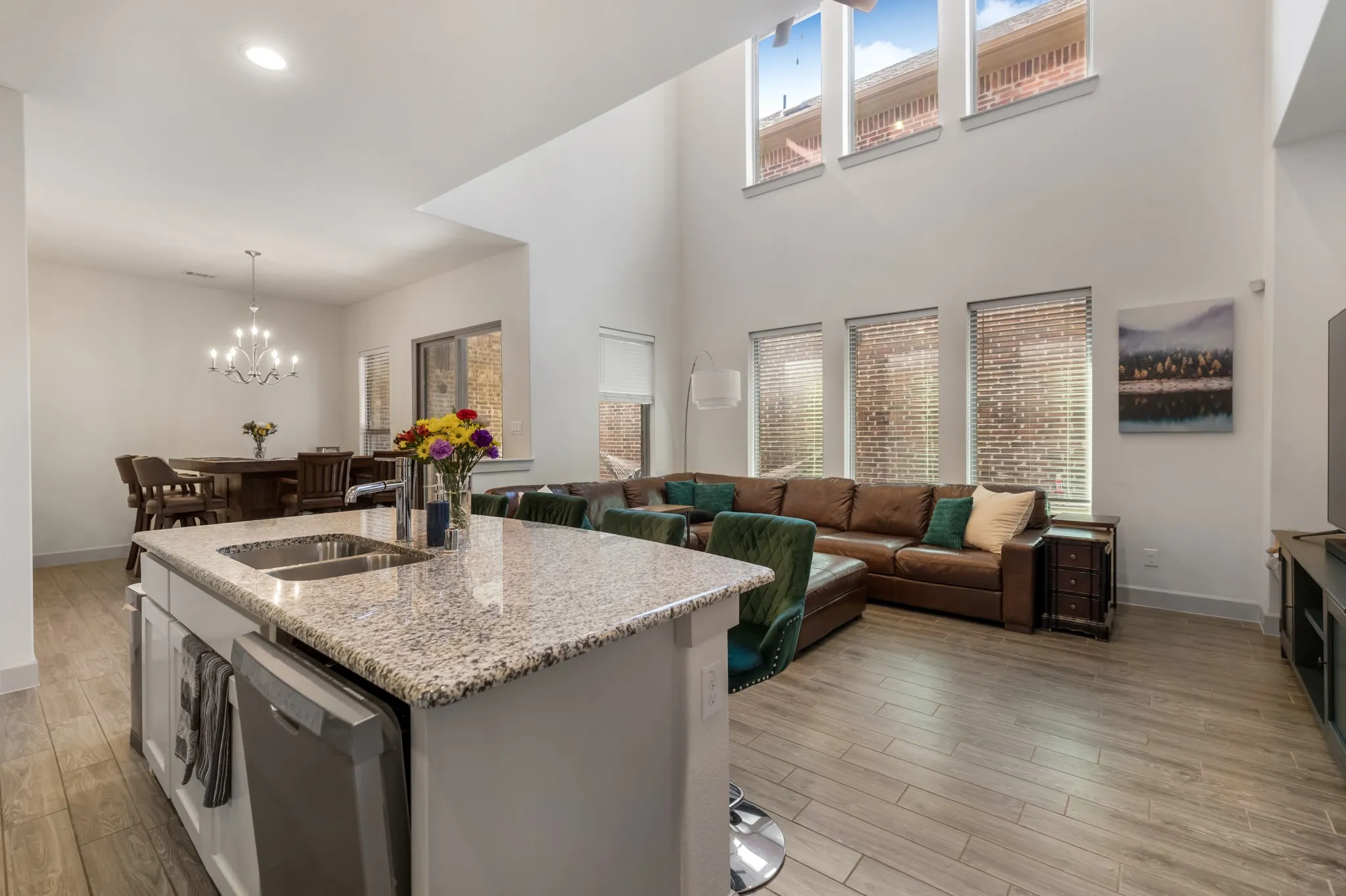 Kitchen island with granite countertop and undermount stainless steel sink
