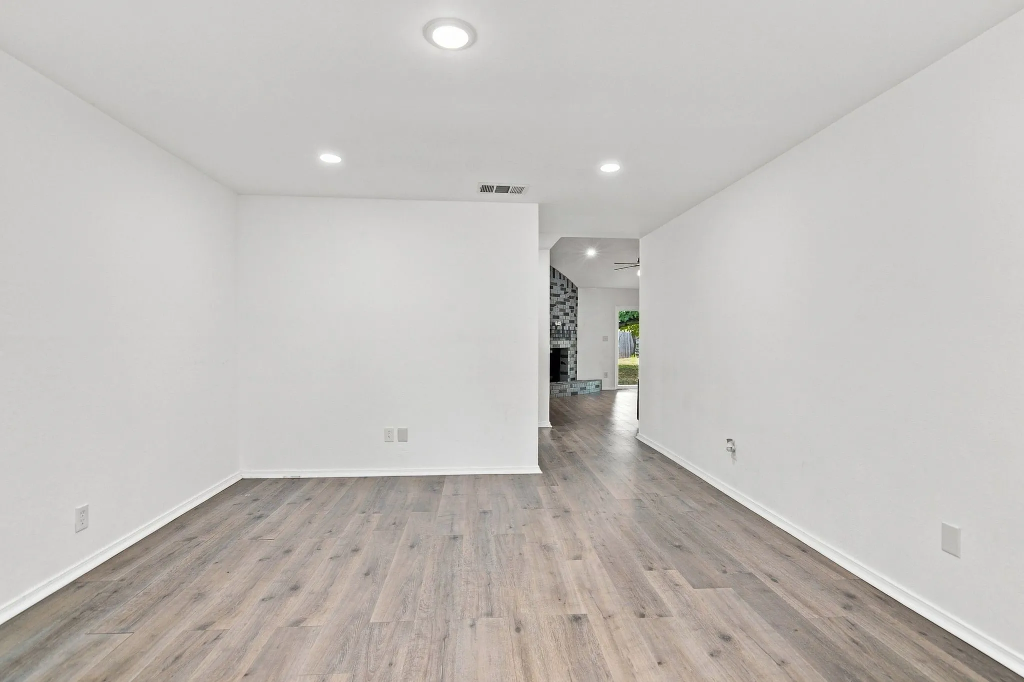 Wood-finish flooring with recessed lighting