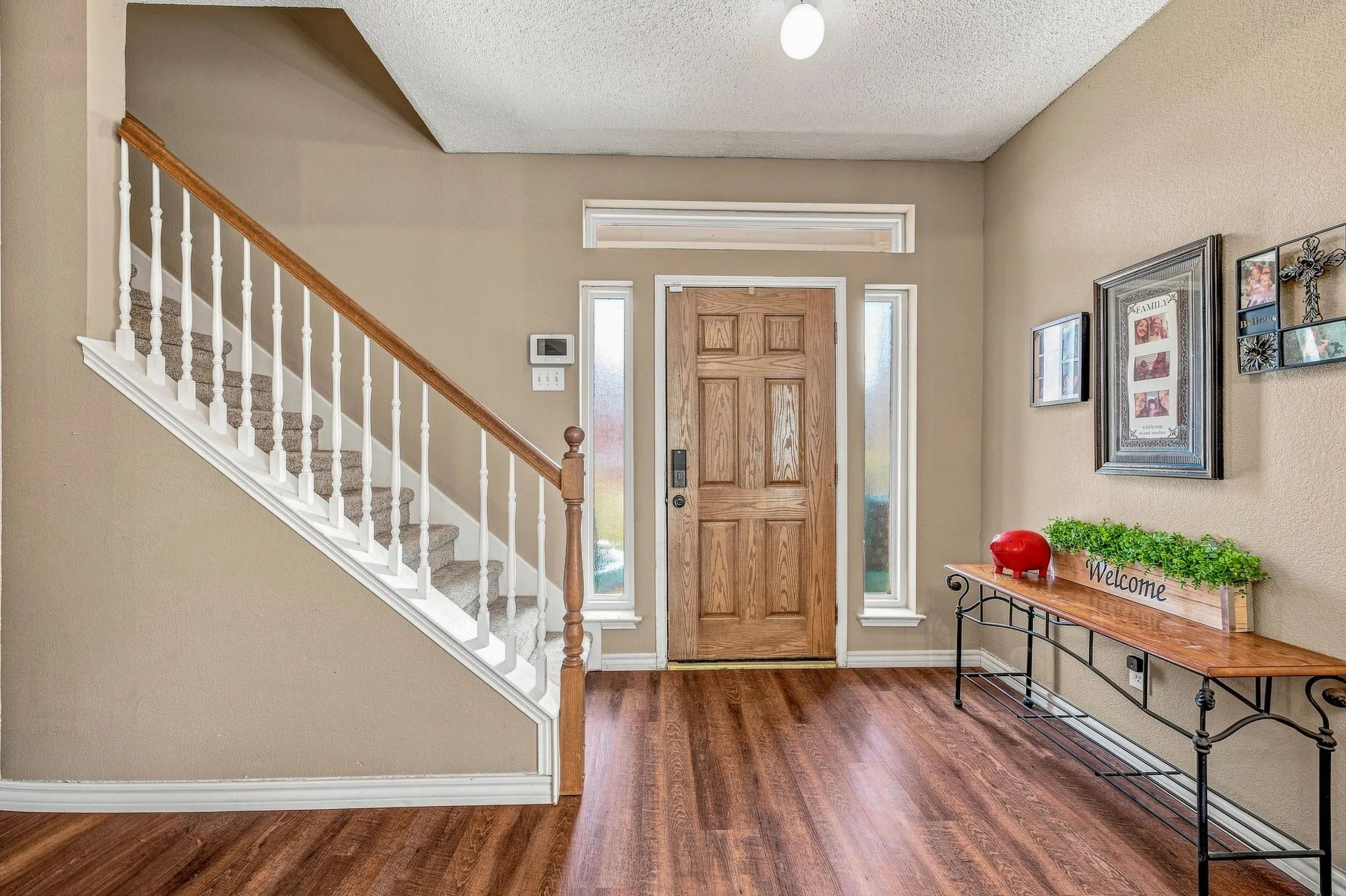 Wood-finish flooring throughout the entryway