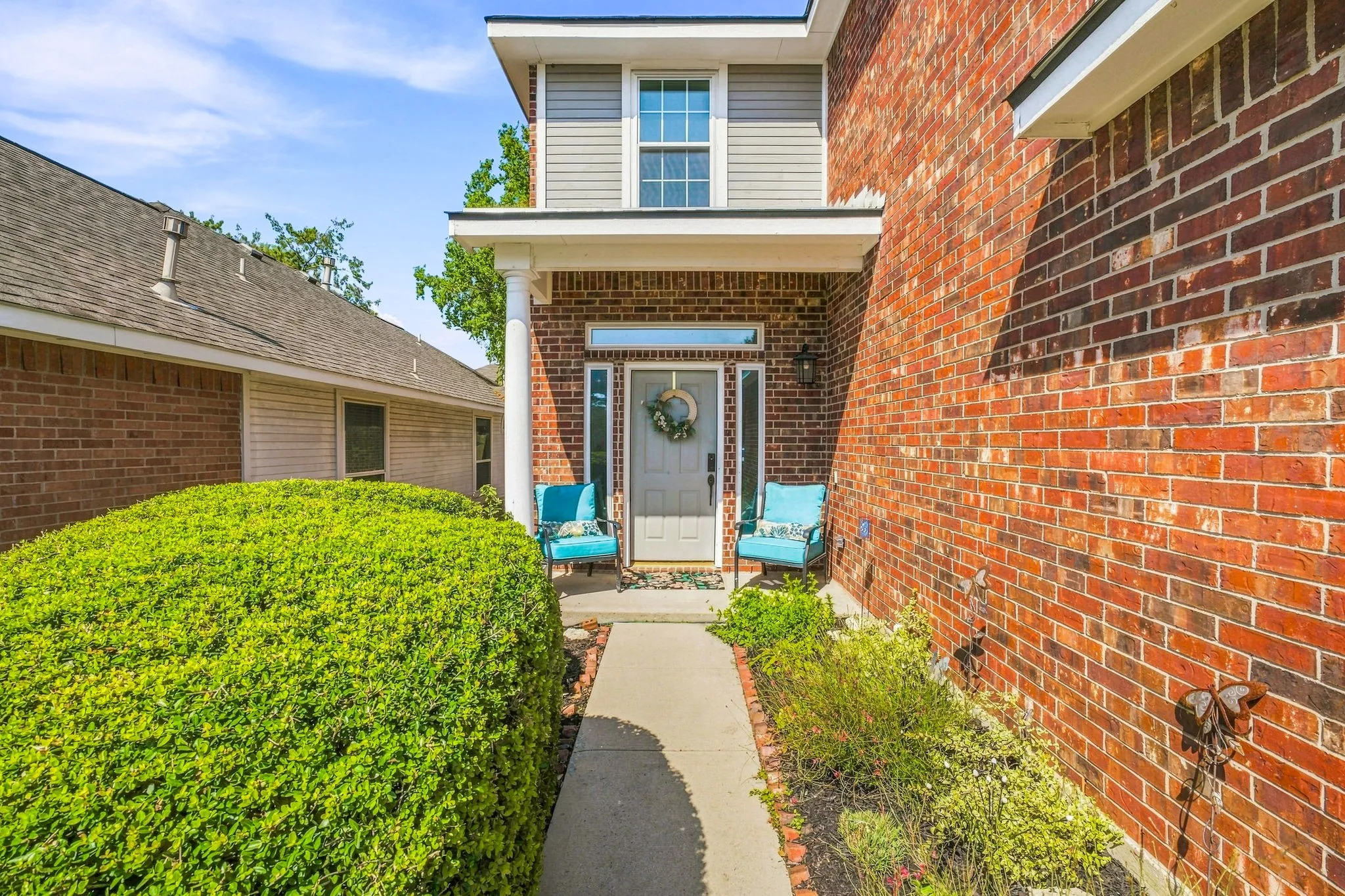 Brick exterior with a second-story siding accent