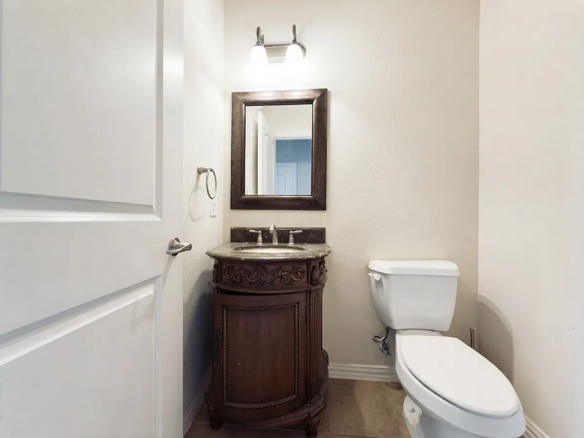 Pedestal vanity with an integrated sink and countertop