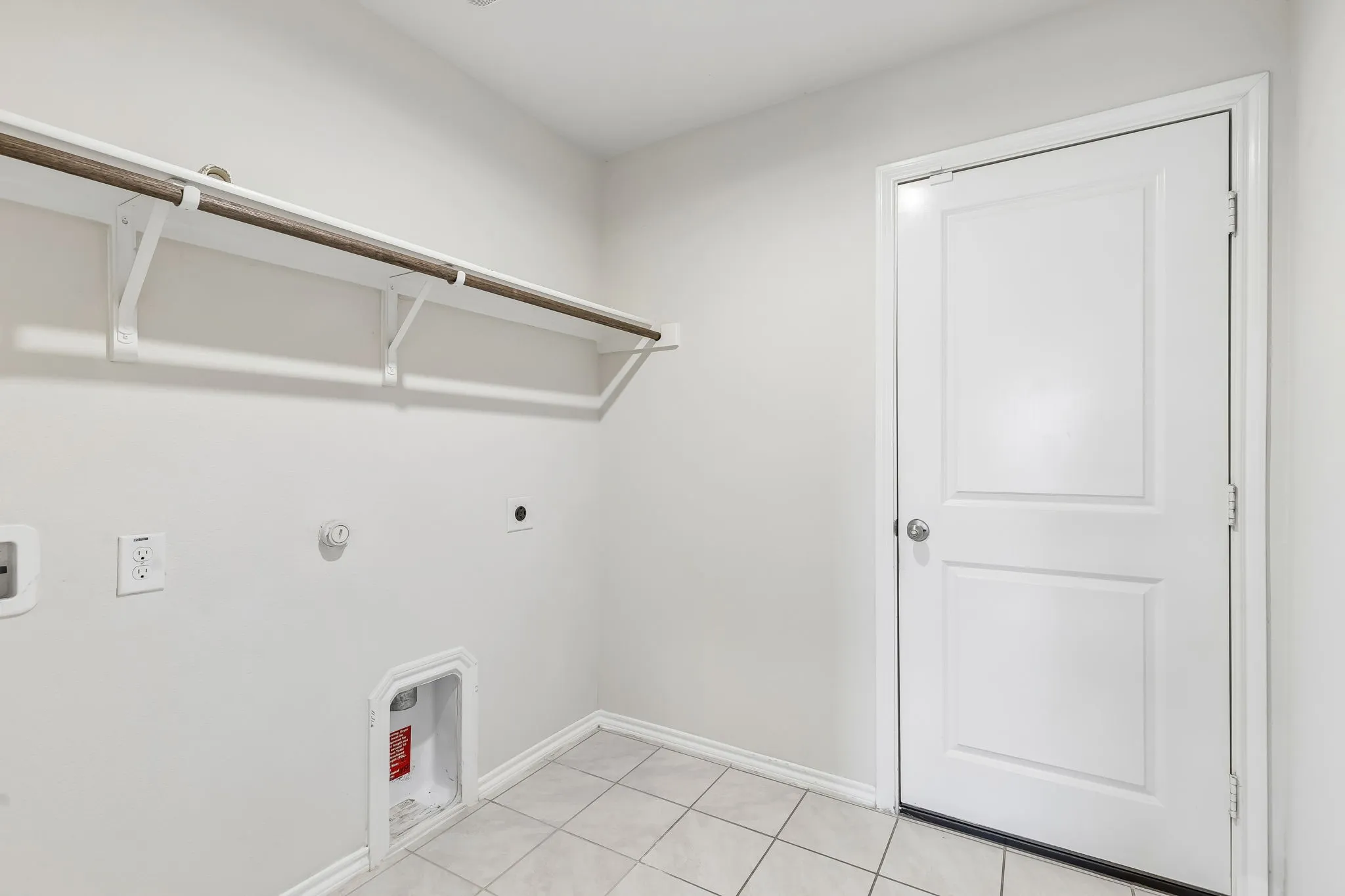 Large laundry room off of garage