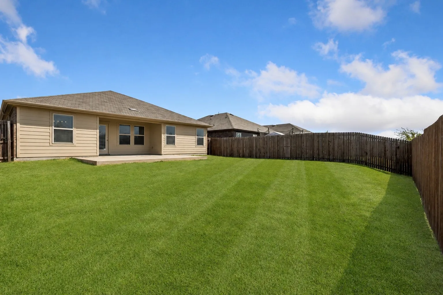 Large fenced in backyard