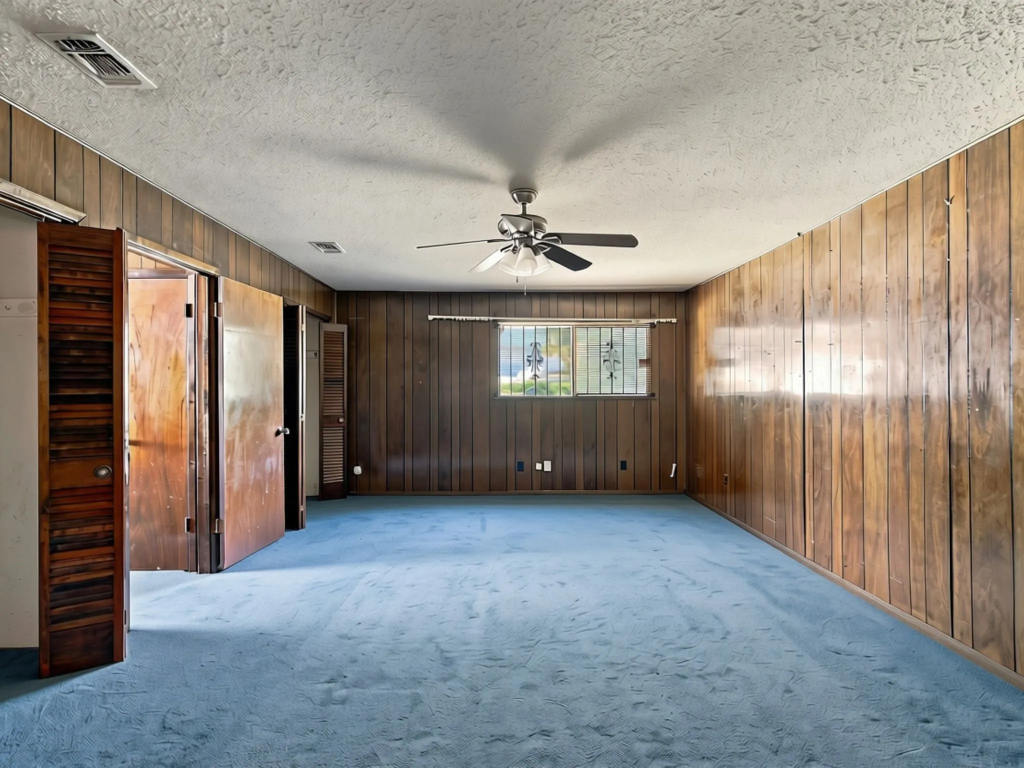 Spacious Primary Bedroom 1 with 2 closet spaces