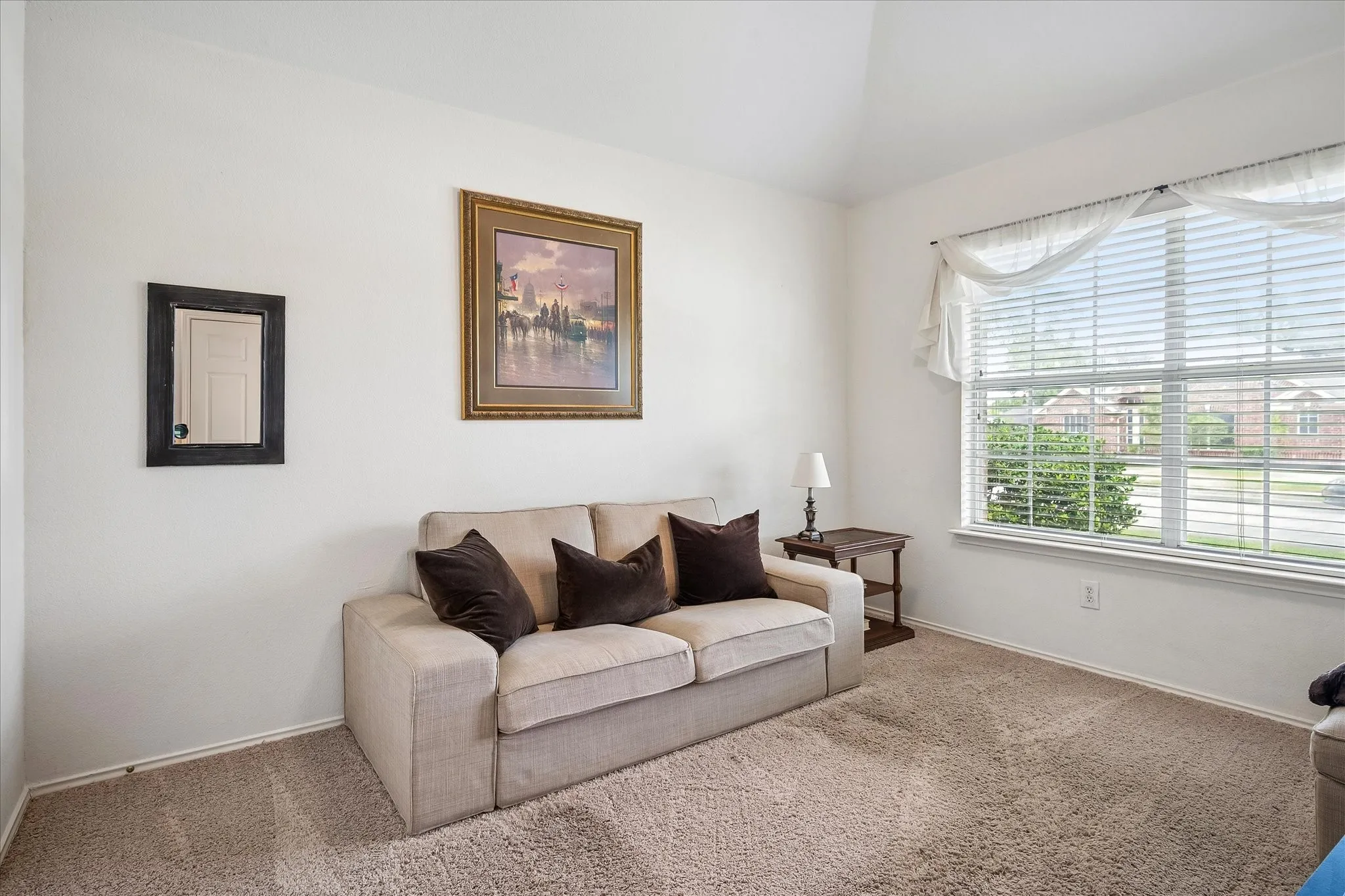 Secondary bedroom being used as a sitting room.