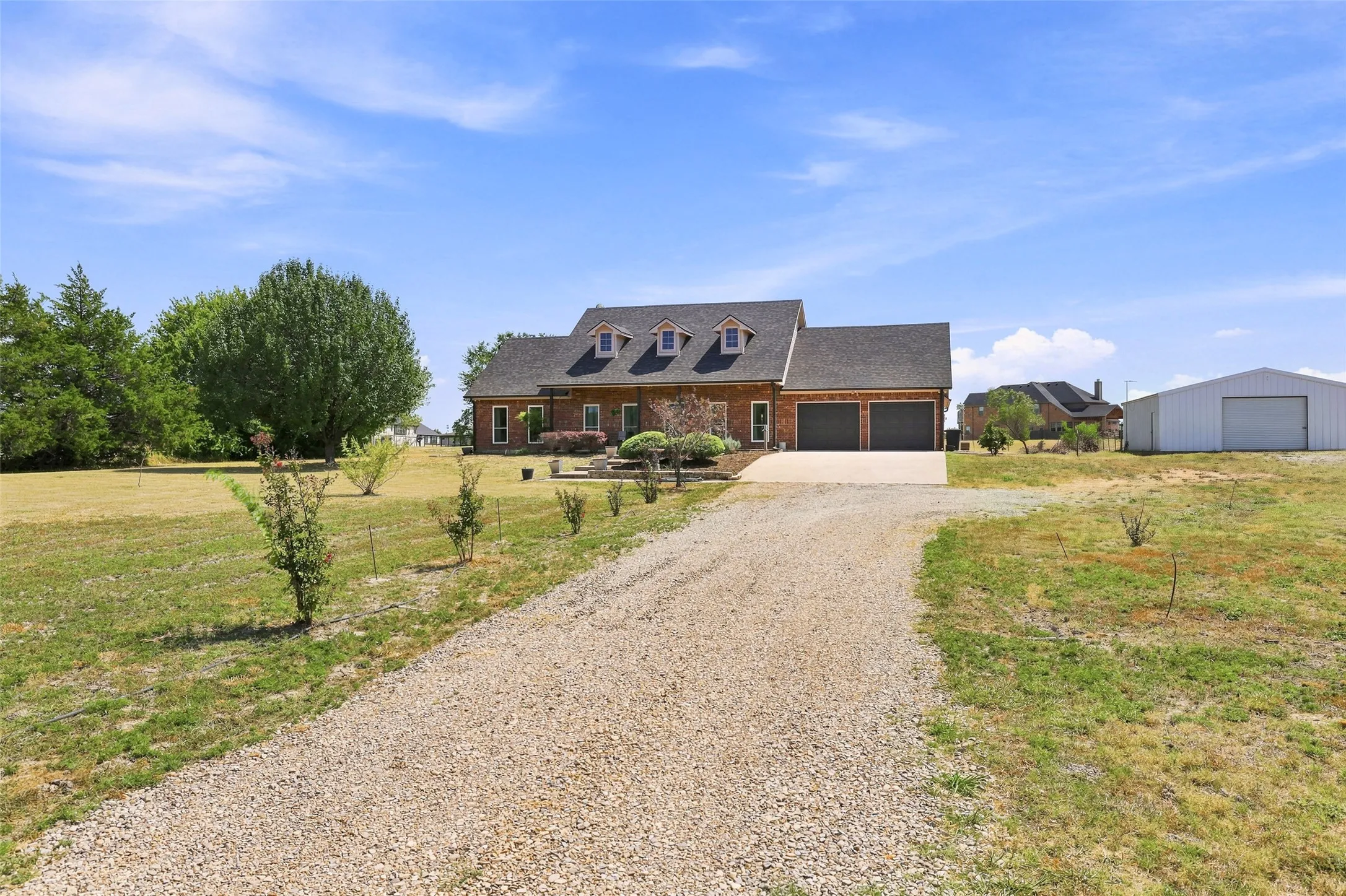 Home is set back from the road with plenty of room for parking