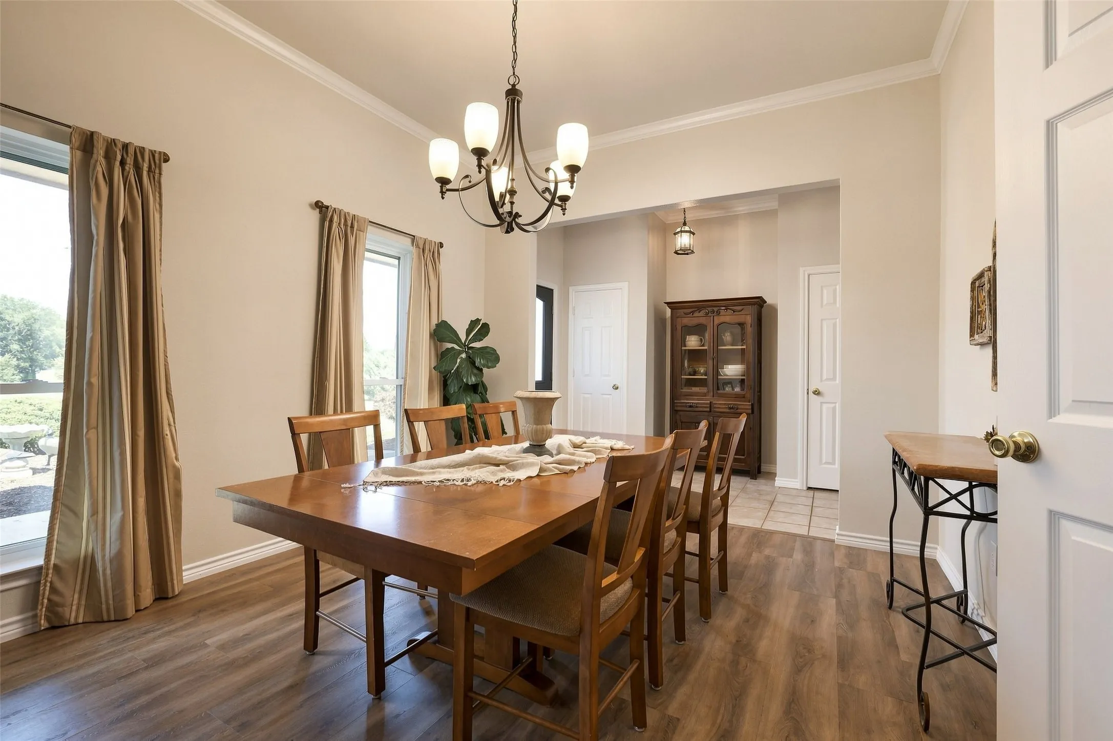 Light fills the dining room from the large recently replaced windows