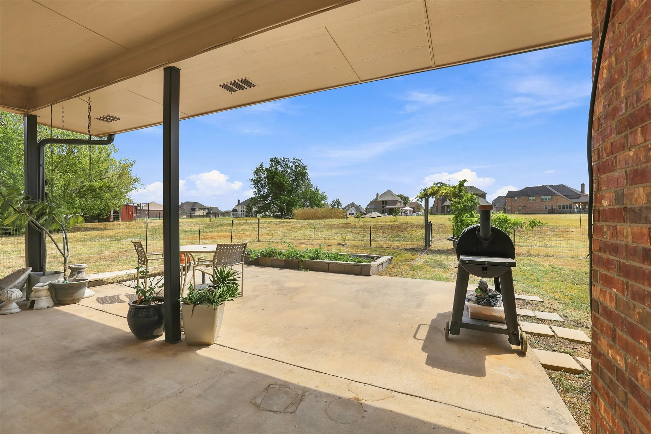 Look at that peaceful view from the covered back patio