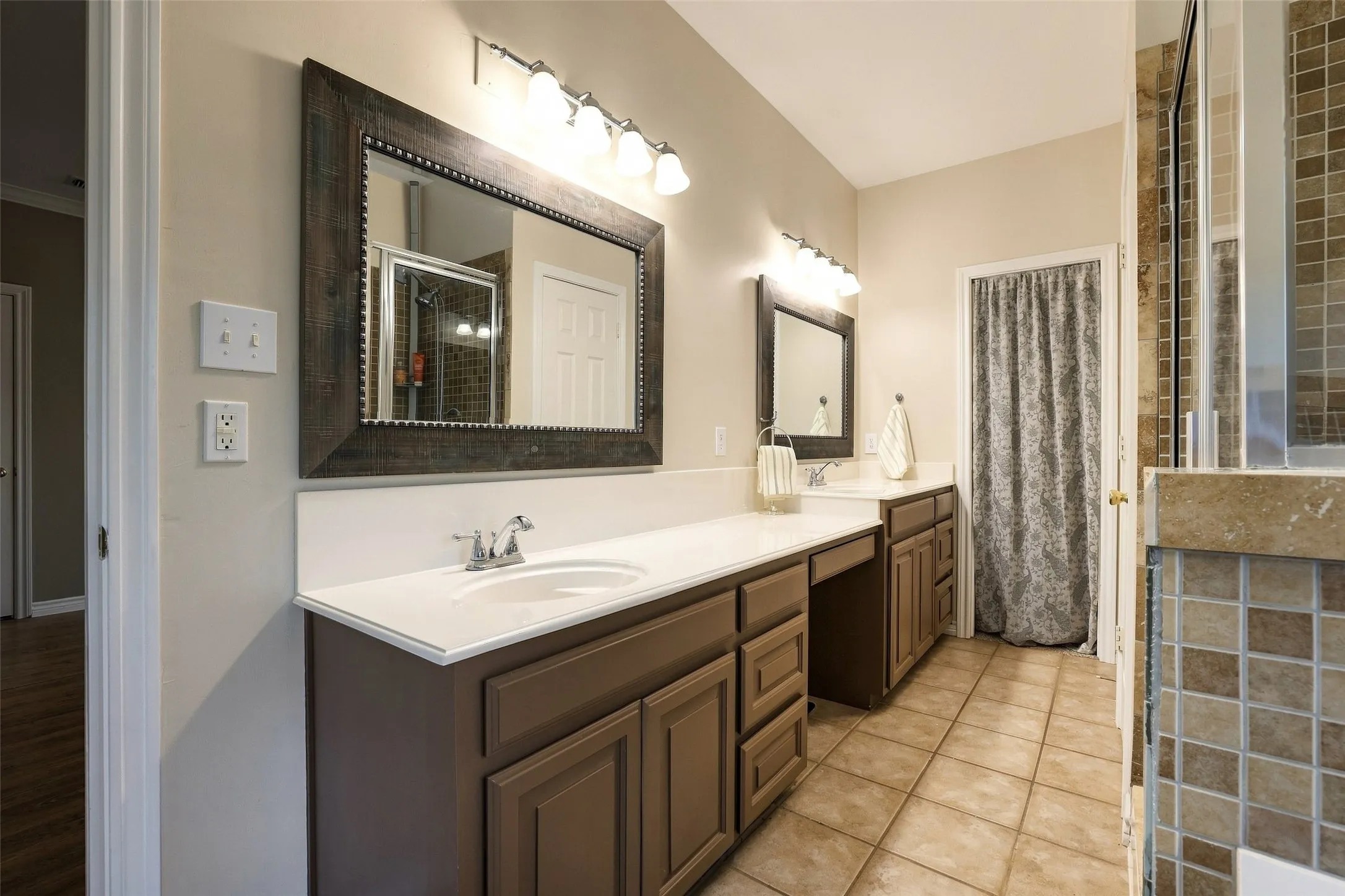 The primary bathroom offers plenty of space