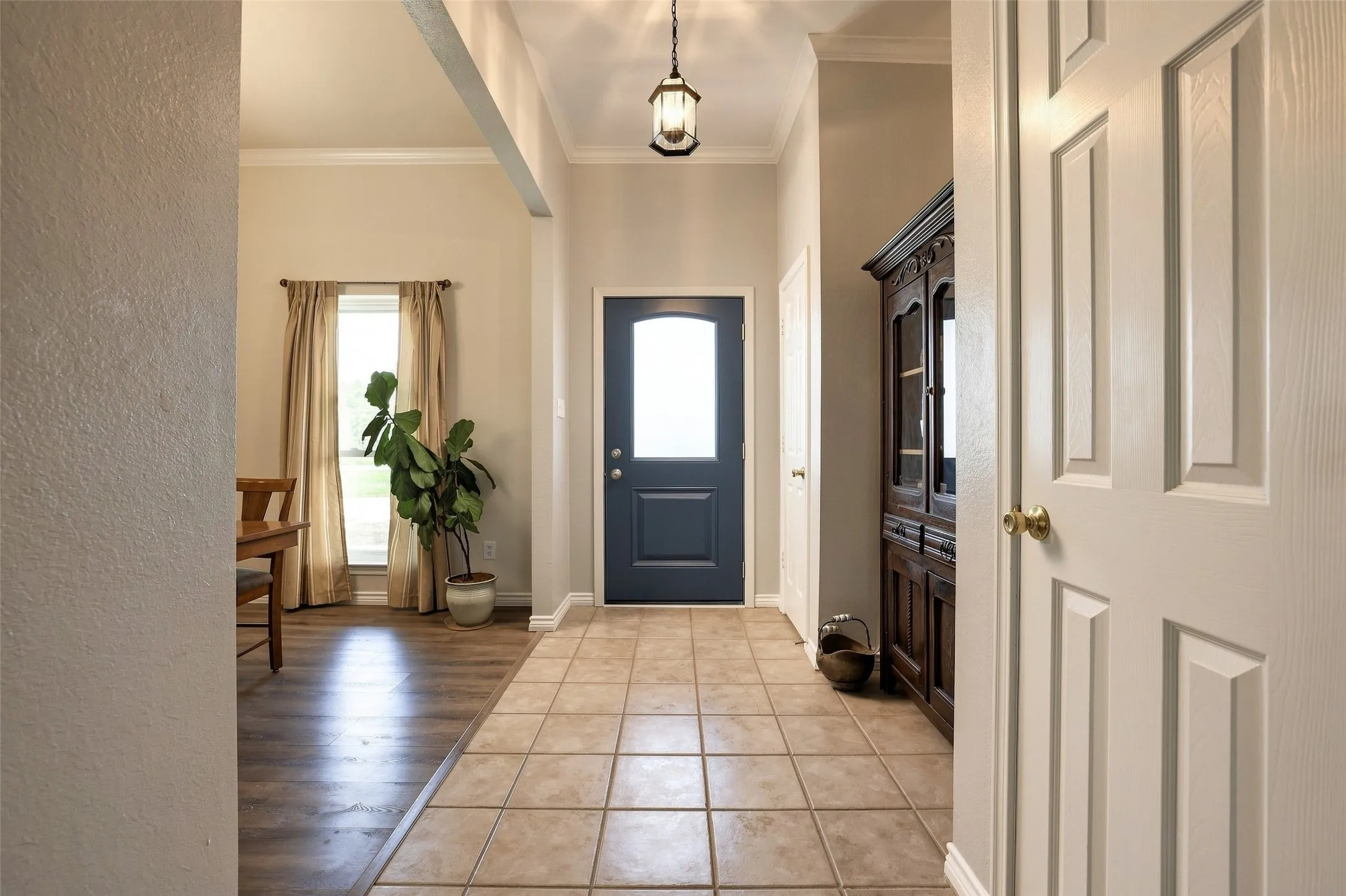 The front door opens to the large dining room