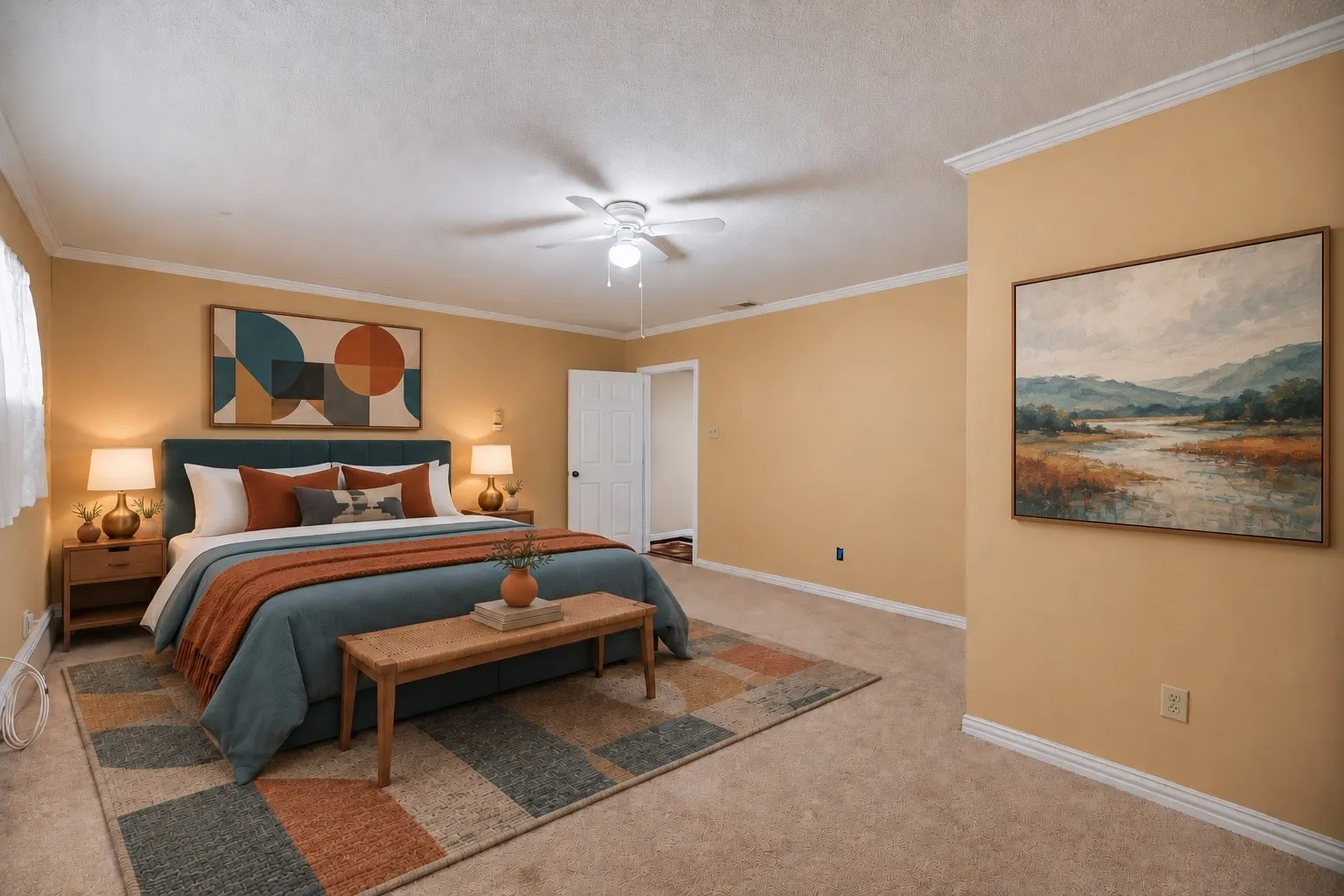 Carpeted flooring, crown molding, and ceiling fan fixture