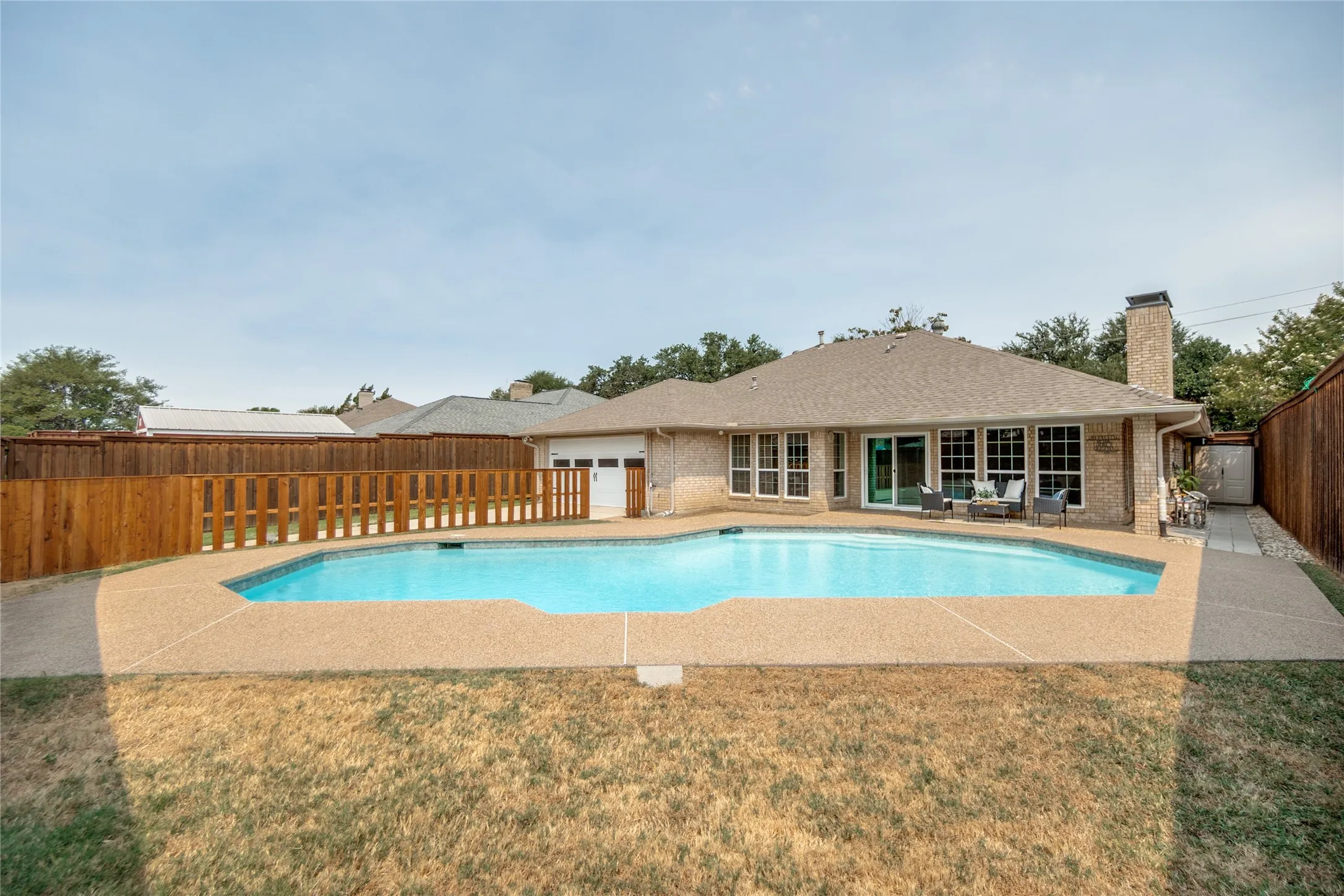 Pool with Grassy Area