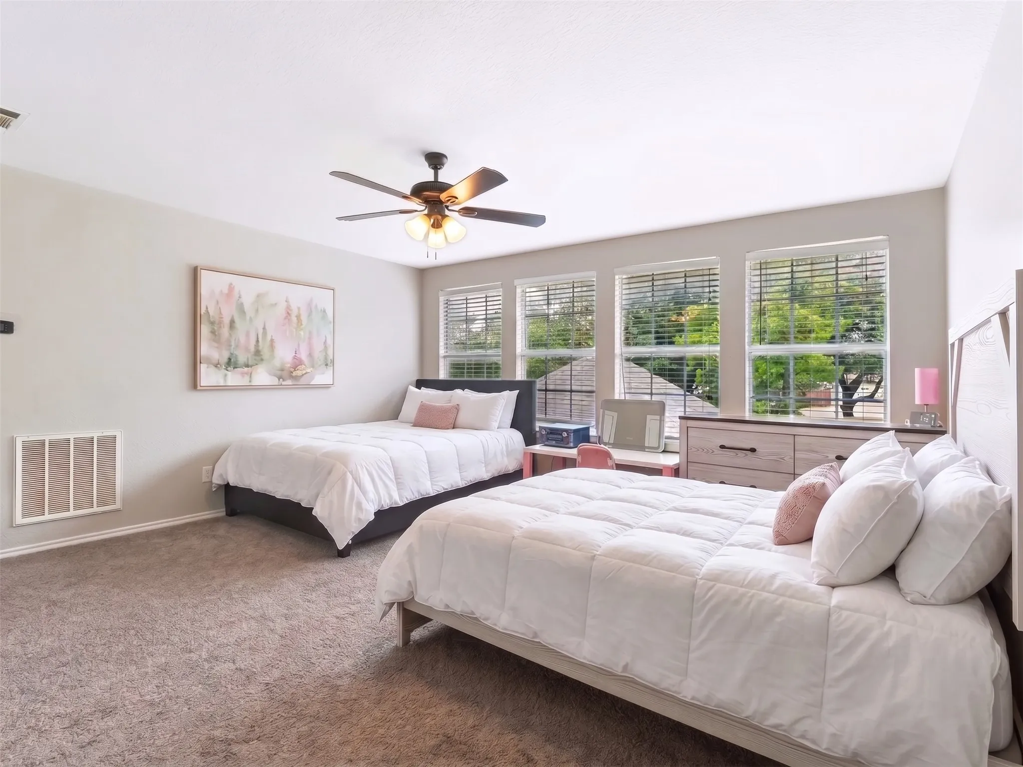 Spacious upstairs bedroom or flex space offering versatile options. Bedding virtually staged