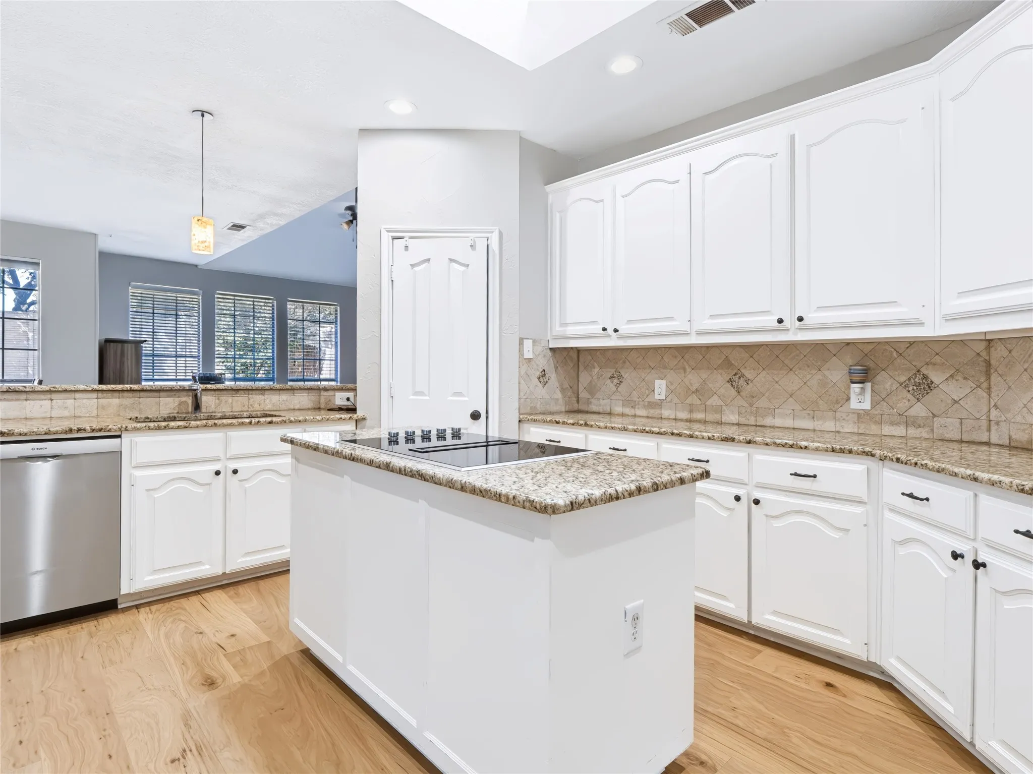 Featuring abundant cabinetry and generous prep space