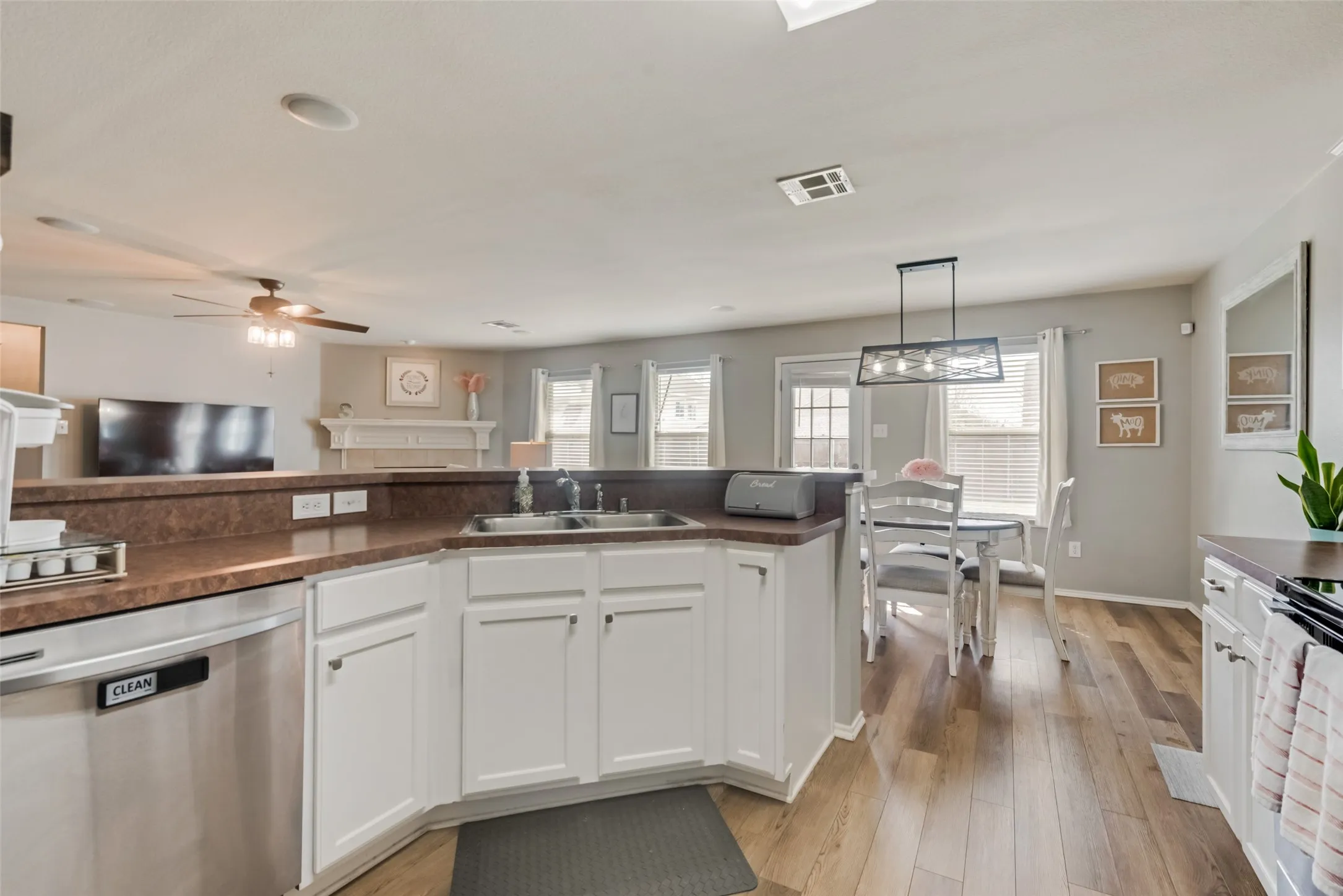 White cabinetry with stainless steel hardware