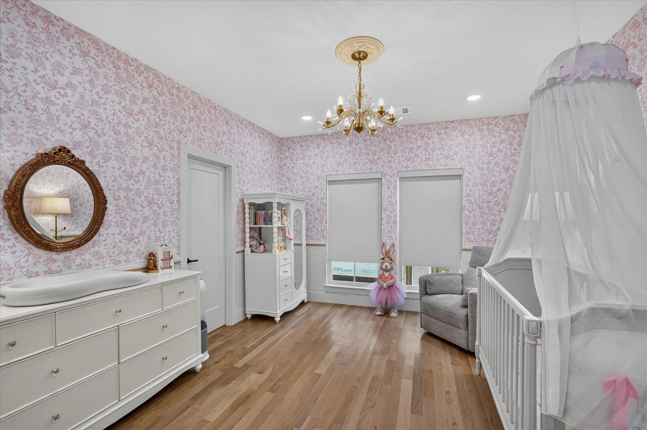 Wood-finish flooring with patterned wallcovering