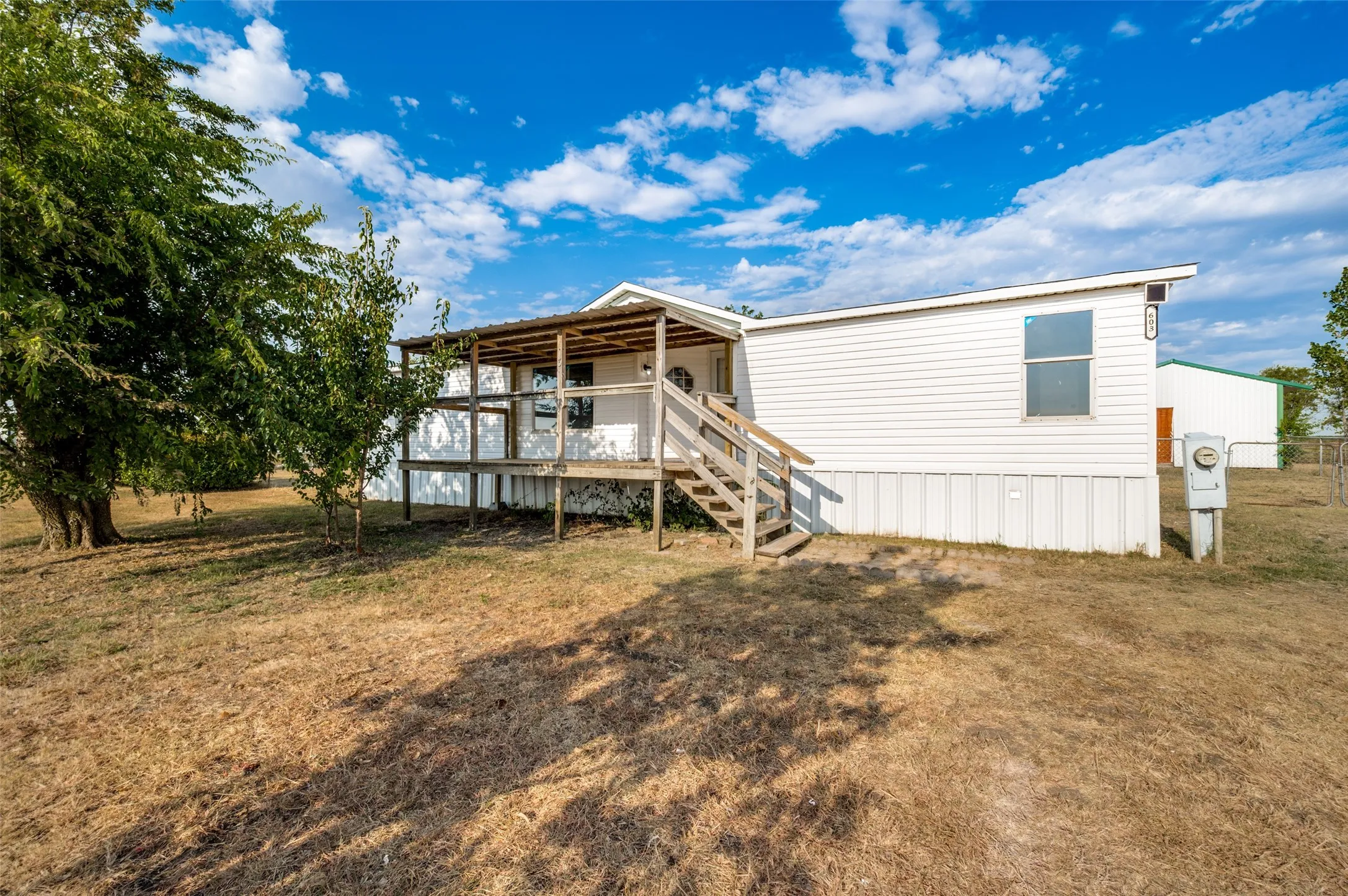 Mobile Home For Sale in Cooke County , 603 County Road 2133, Valley View, Texas 76272, 3 Bedroom, 2 Bathroom, Garage spaces, 1,456 Sqft, built in 1999, mls#21361290, Real Estate Agent in Valley View, Homes For Sale in Cooke county, Homes For Sale in Valley View, Realtor in Valley View Texas, Real Estate Brokerage Independent Realty Texas, Luminita Cordes Realtor