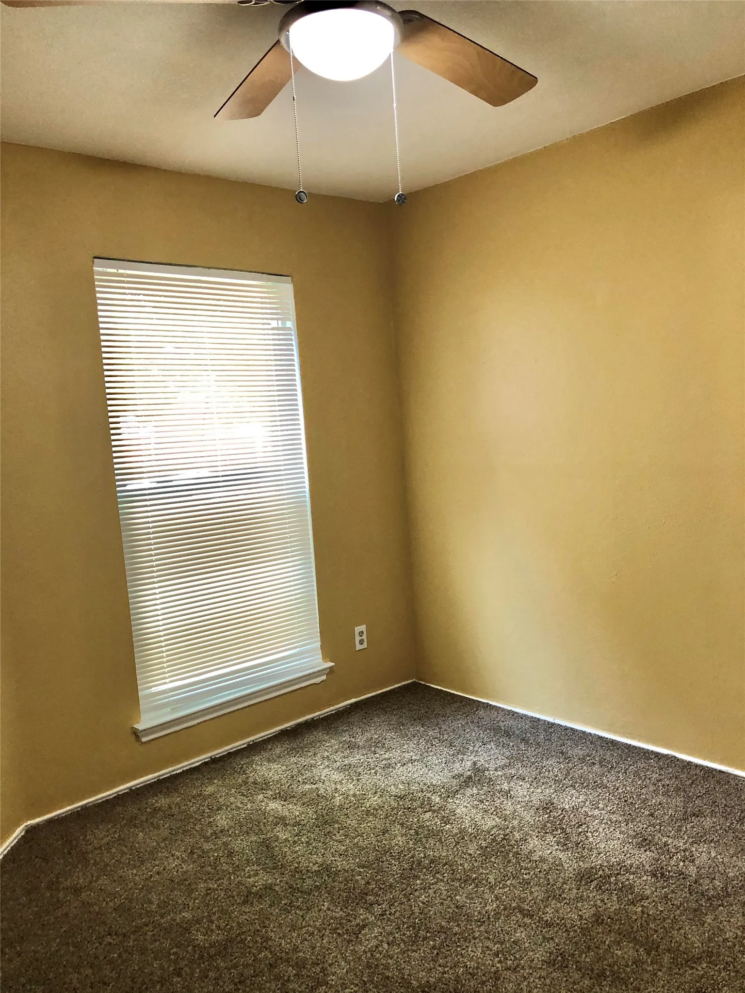 Bedroom 2 has a door that leads to a deck outside