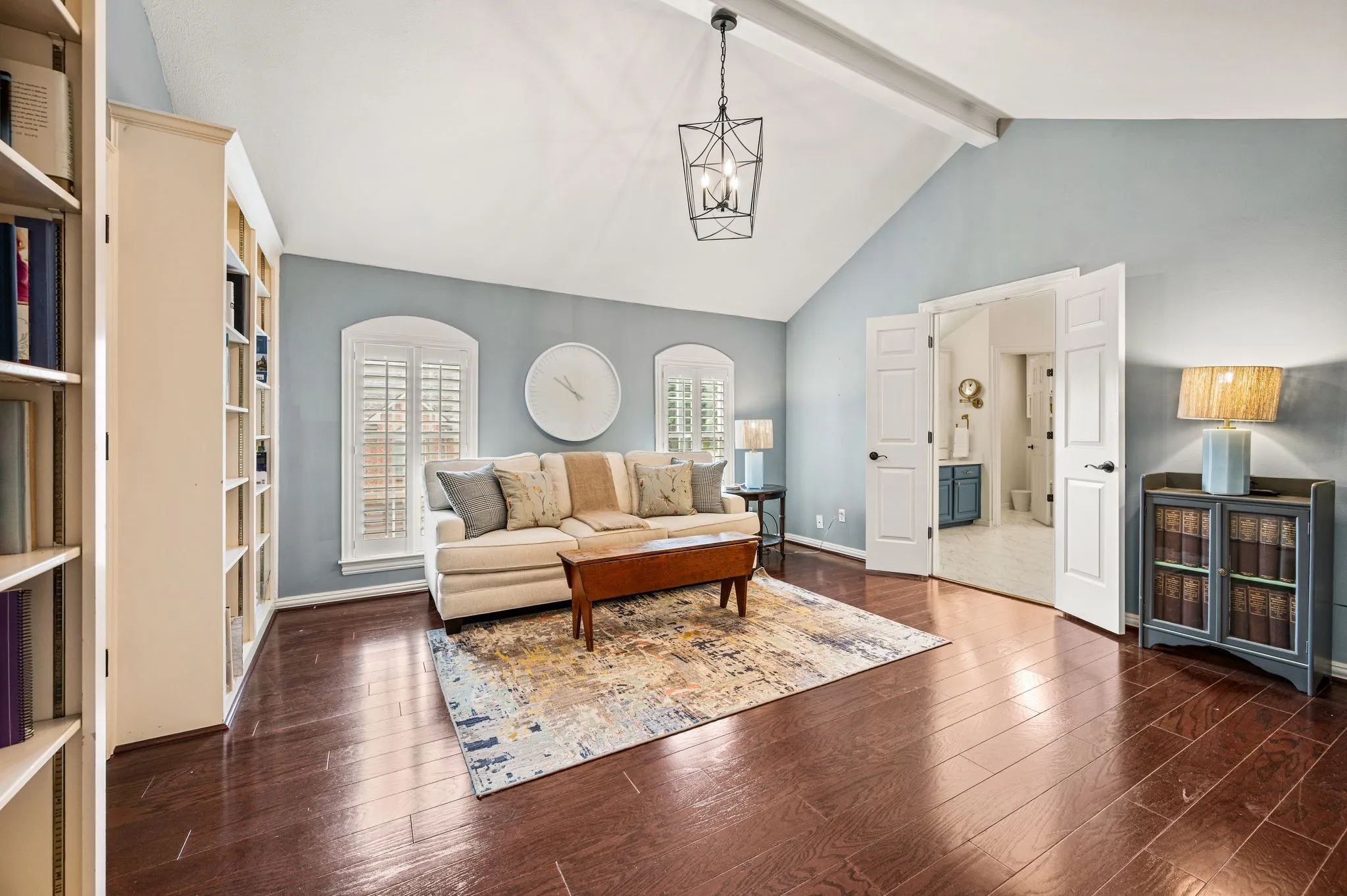 A private sitting room just off the owner's suite creates an intimate retreat of its own, with built-ins and enough space to truly settle in.