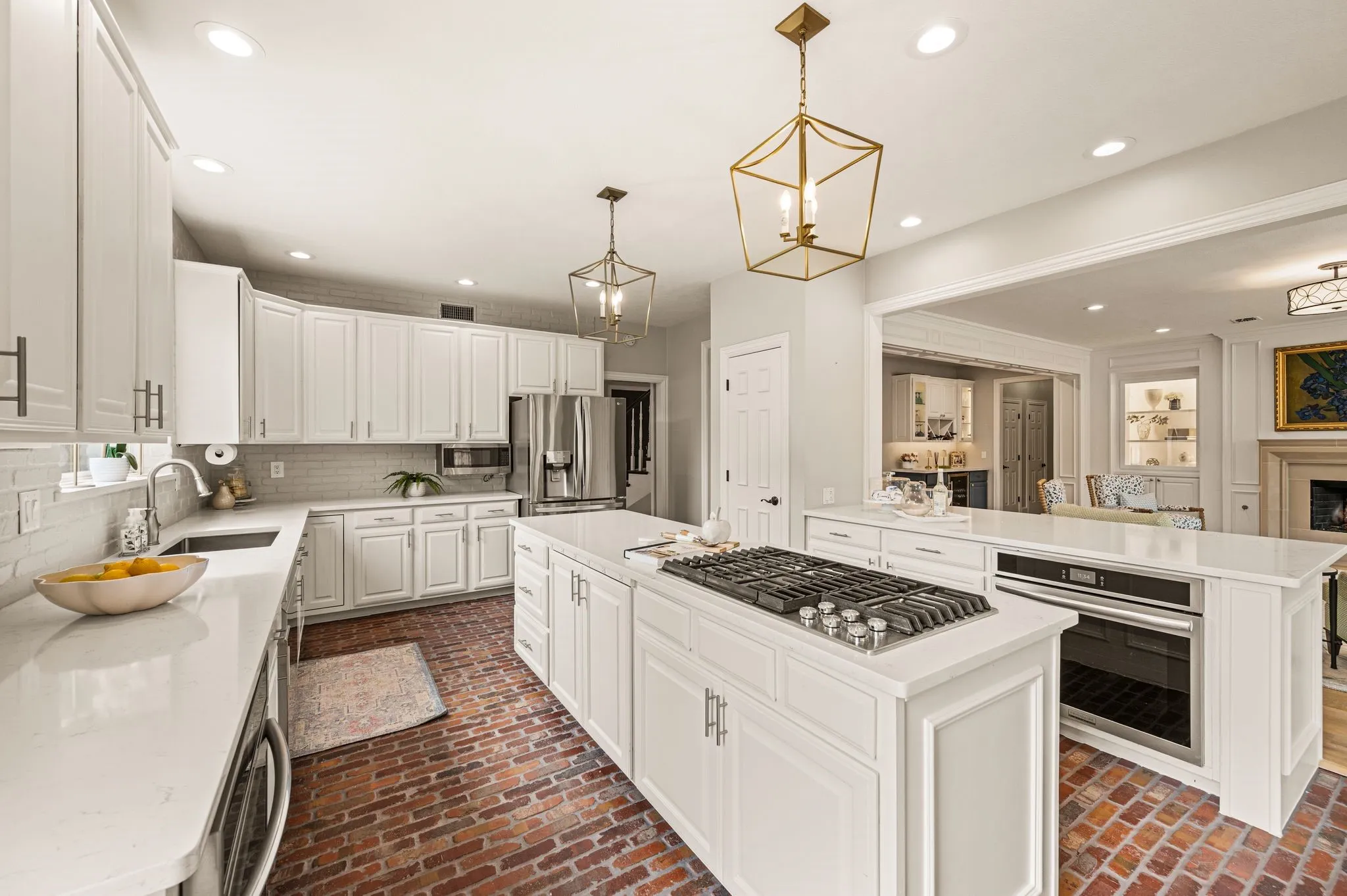 The kitchen opens easily into the living room and breakfast area, keeping the heart of the home connected from one space to the next.