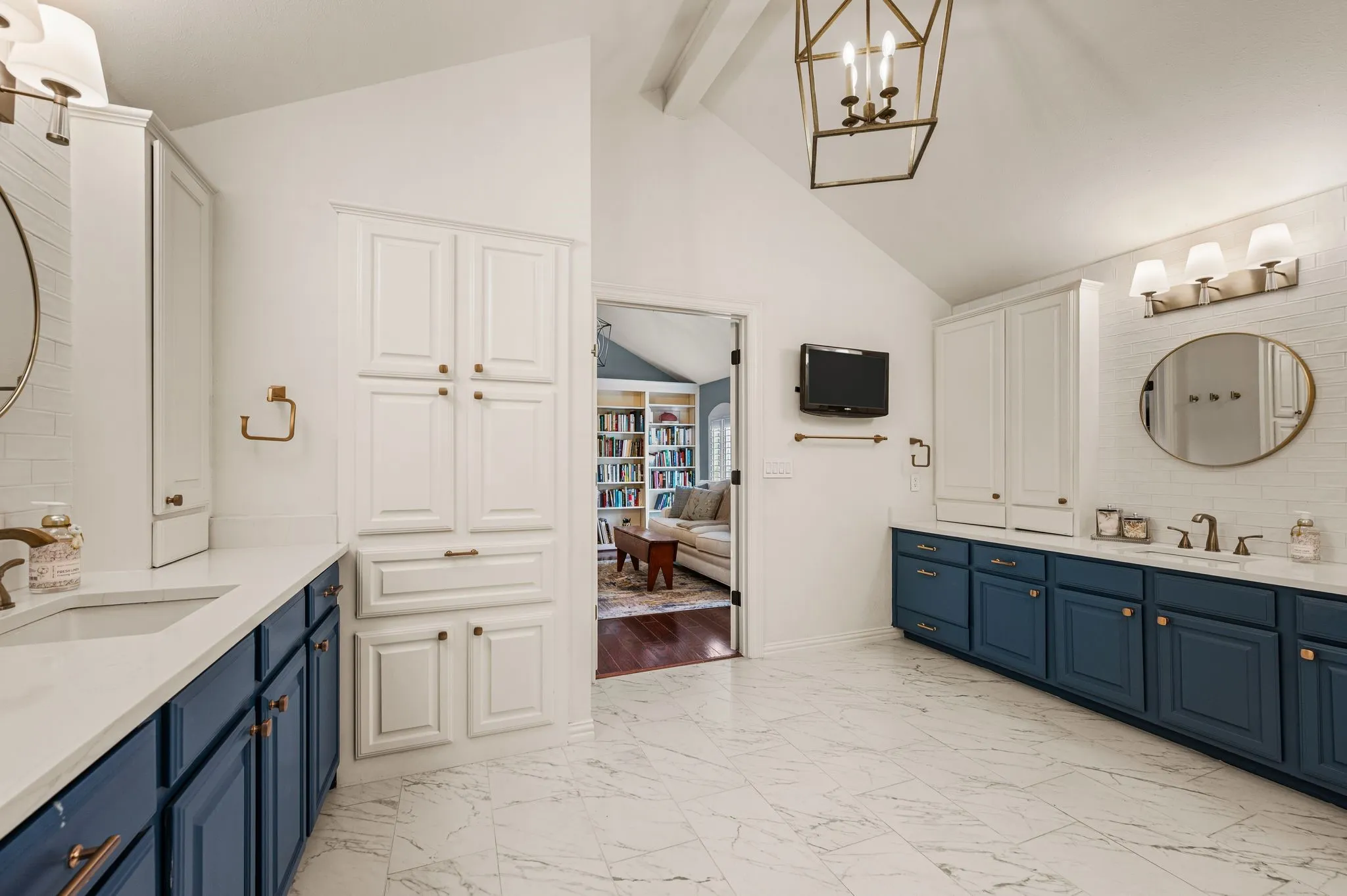 Additional cabinetry and generous counter space make the owner's bath as functional as it is beautifully finished.