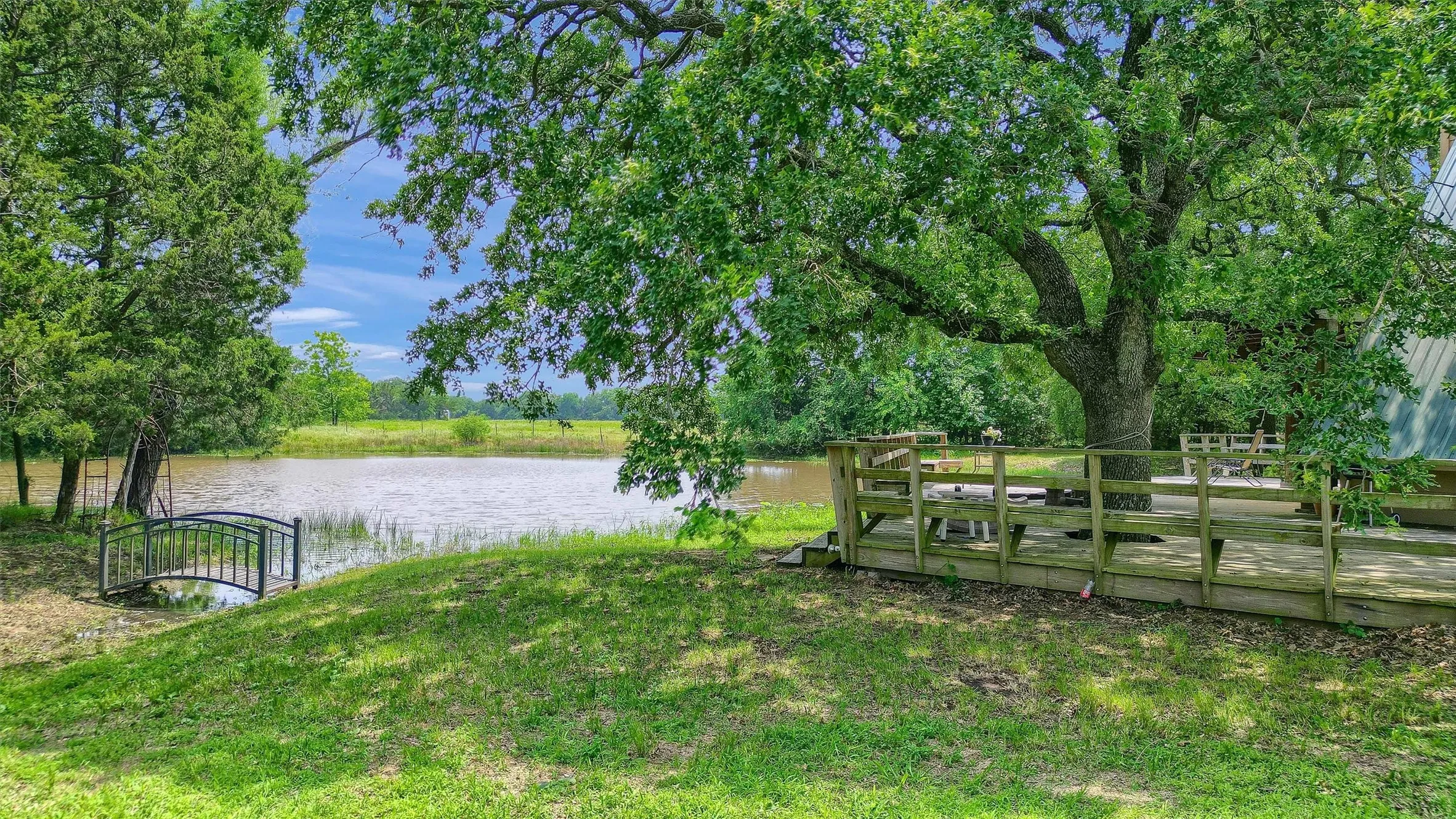 View of yard with a water view