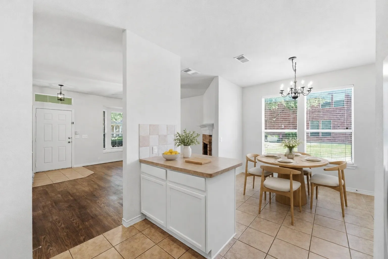 Virtually staged kitchen and breakfast area showing the possibilities for everyday dining and entertaining.
