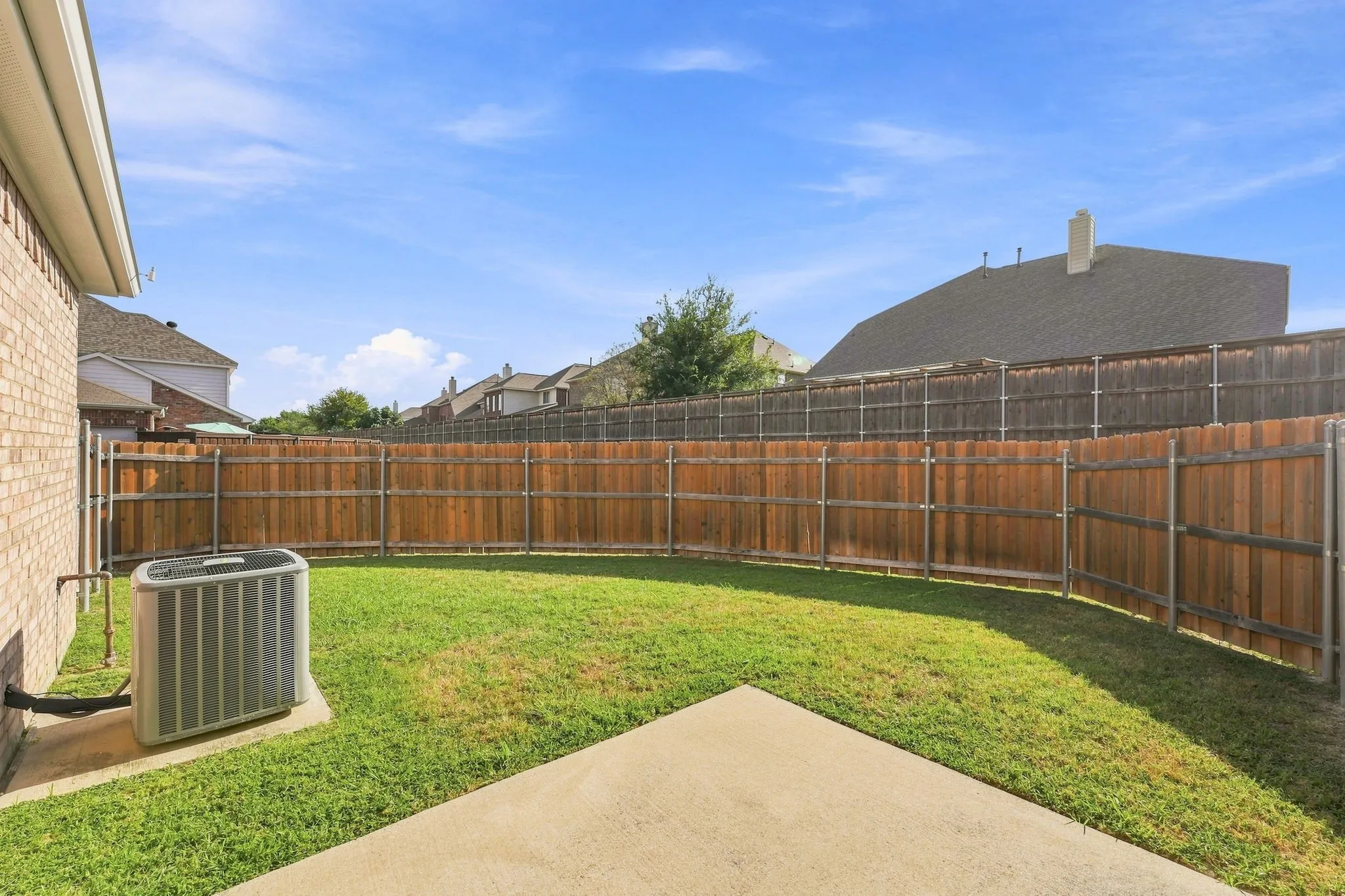 Enjoy a private backyard with lawn maintenance included.