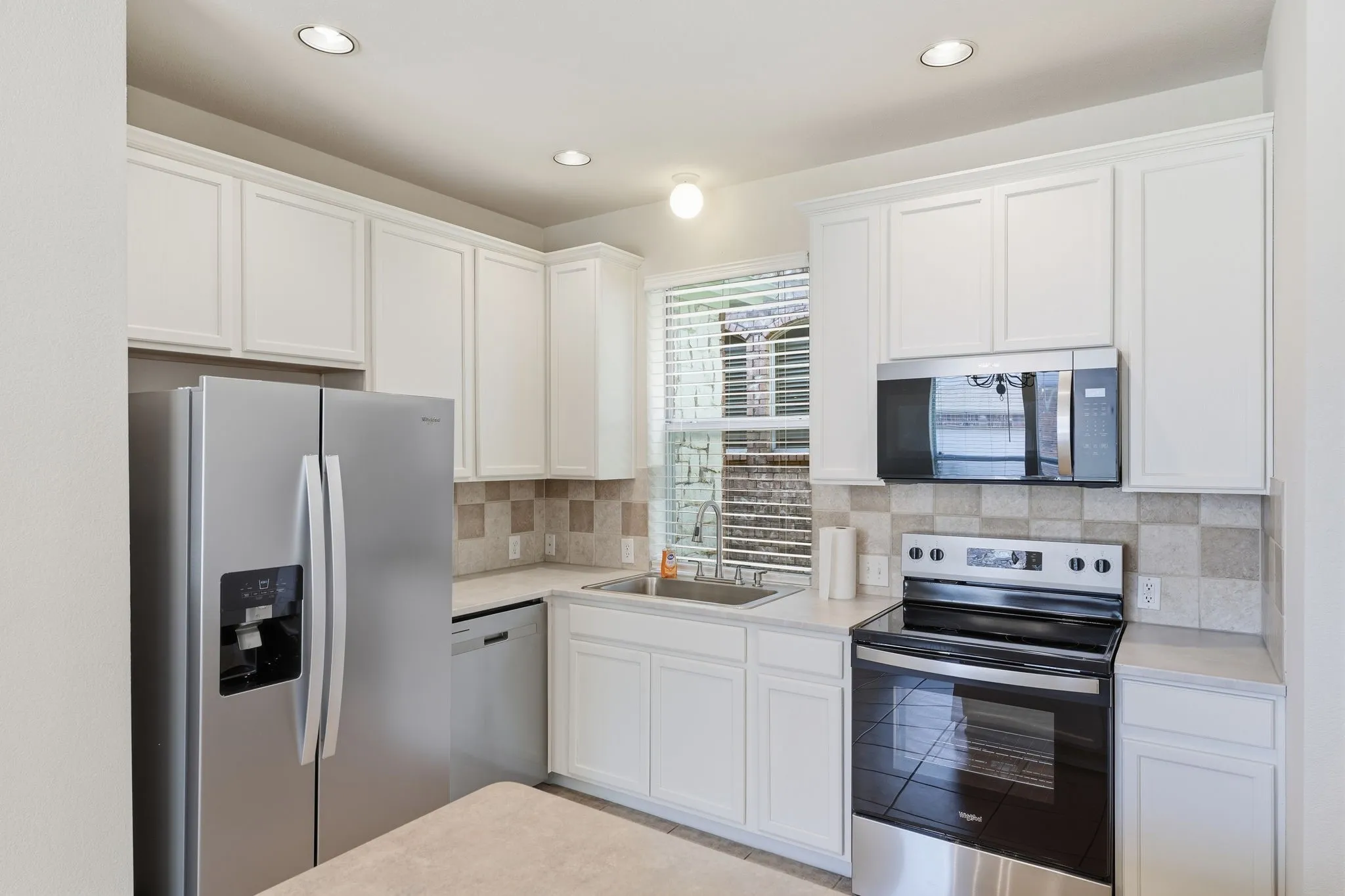 Clean and full of new appliances (July 2026) for the new tenant. Fridge stays!