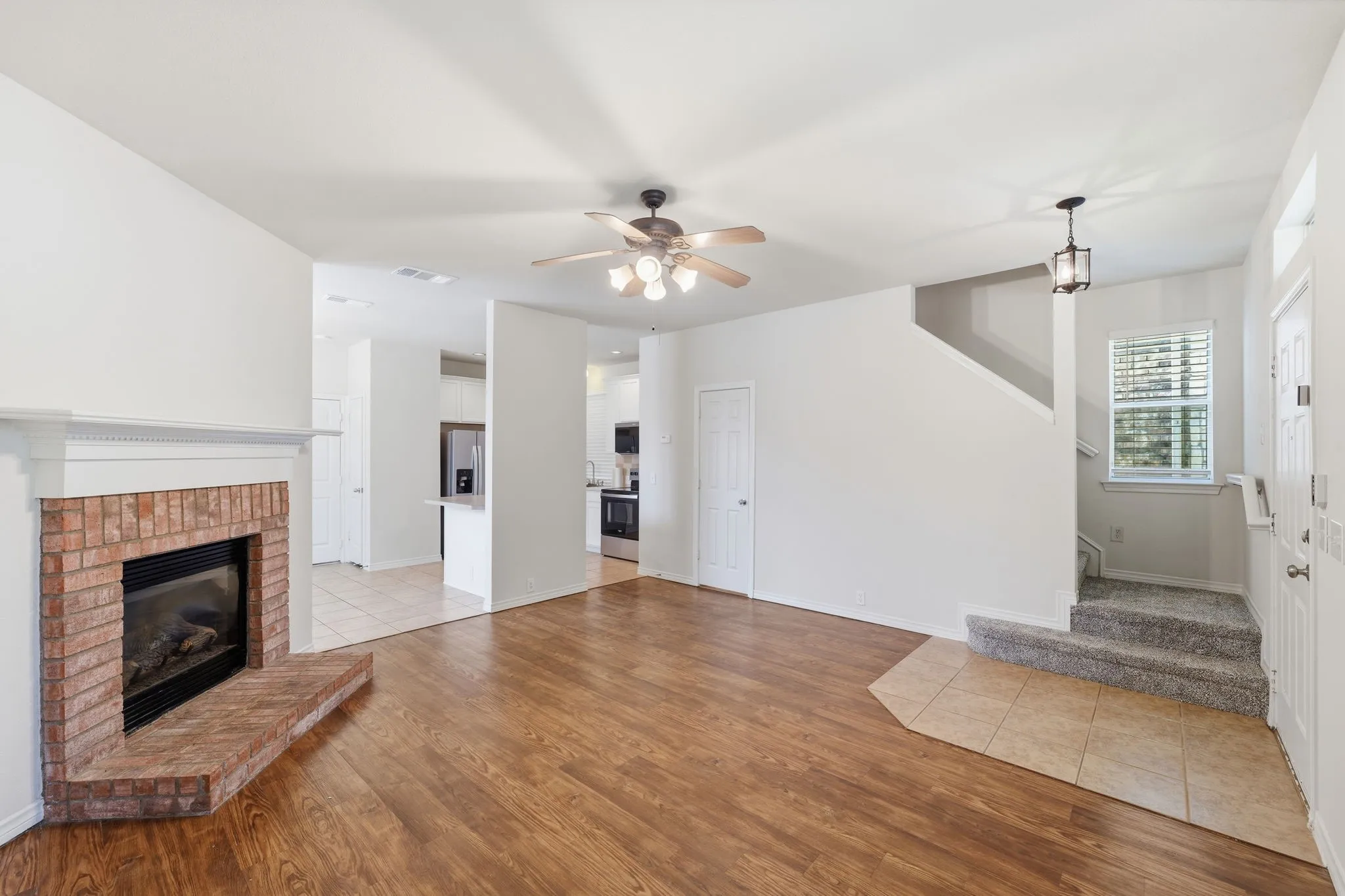 Living room featuring abundant natural light and fresh interior paint.