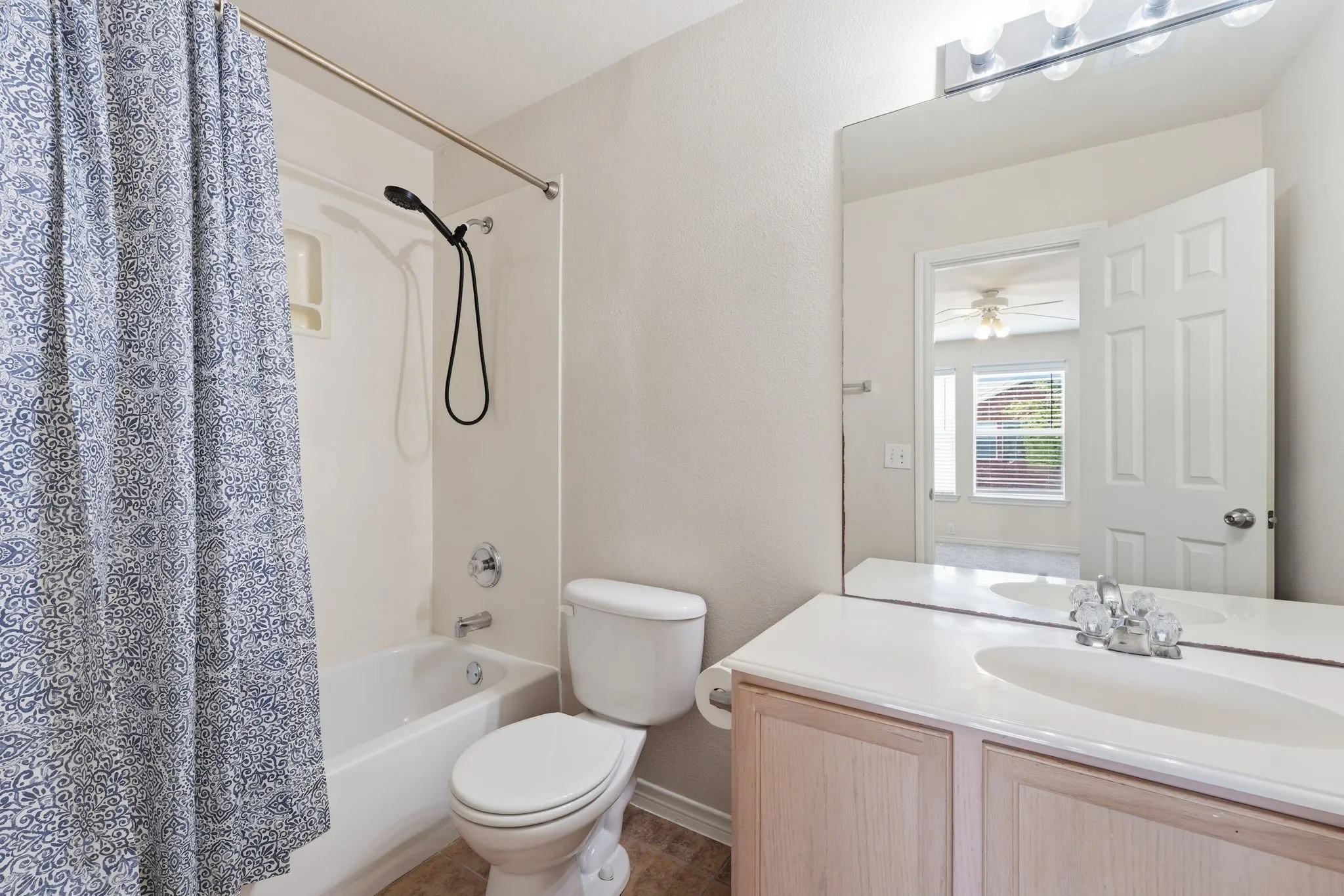 Private full bath conveniently located within the primary suite