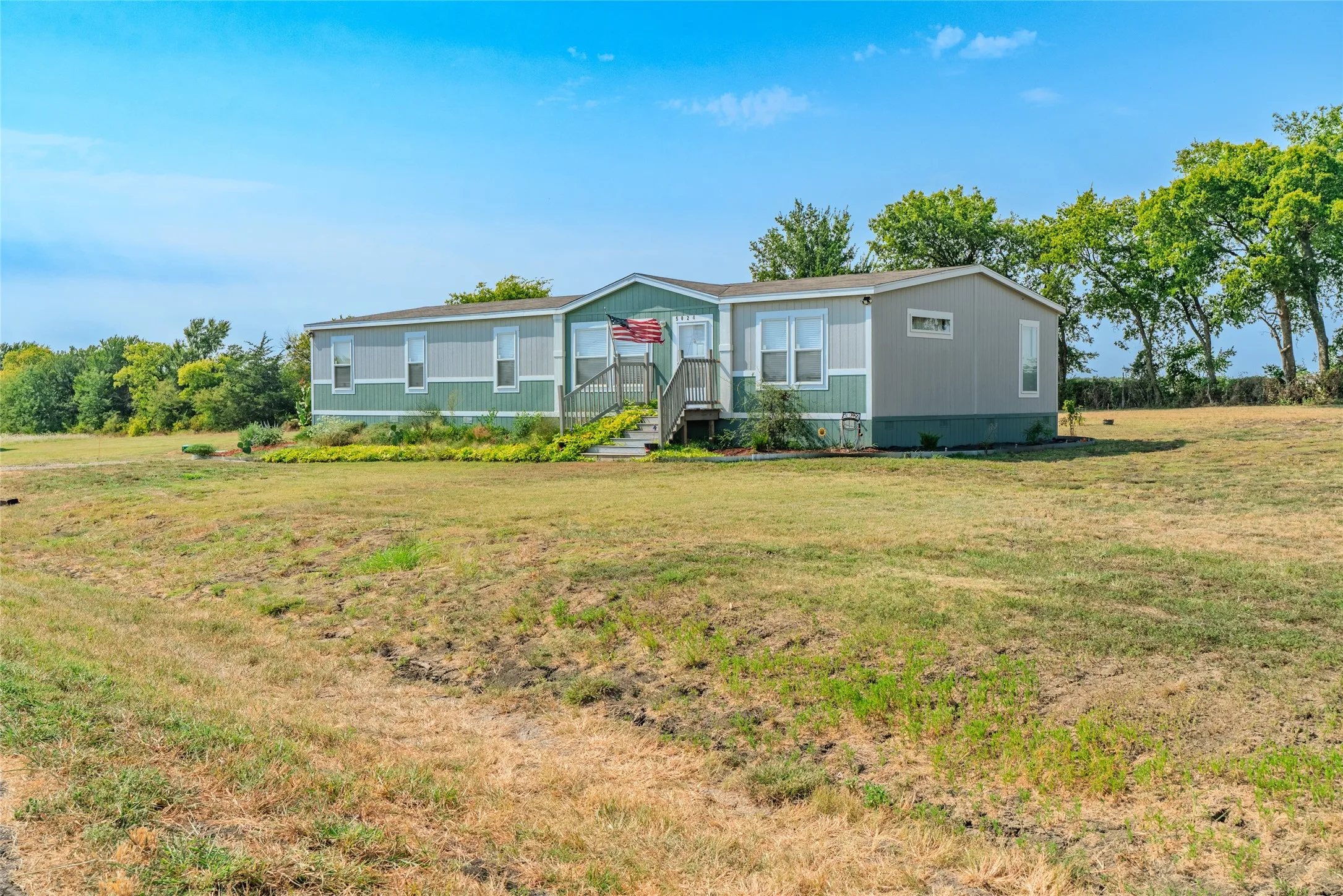 Manufactured Home For Sale in Hunt County , 5024 Dove Street, Greenville, Texas 75401, 4 Bedroom, 2 Bathroom, Garage spaces, 2,176 Sqft, built in 2024, mls#21367708, Real Estate Agent in Greenville, Homes For Sale in Hunt county, Homes For Sale in Greenville, Realtor in Greenville Texas, Real Estate Brokerage Independent Realty Texas, Luminita Cordes Realtor
