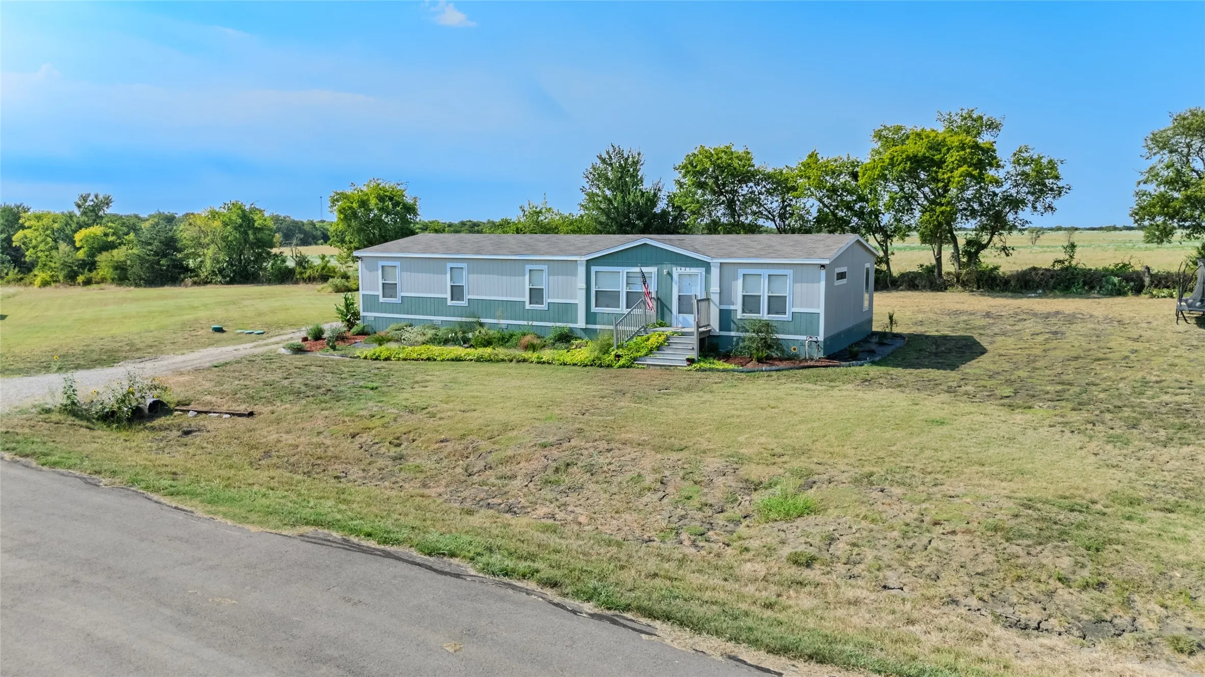 Manufactured Home For Sale in Hunt County , 5024 Dove Street, Greenville, Texas 75401, 4 Bedroom, 2 Bathroom, Garage spaces, 2,176 Sqft, built in 2024, mls#21367708, Real Estate Agent in Greenville, Homes For Sale in Hunt county, Homes For Sale in Greenville, Realtor in Greenville Texas, Real Estate Brokerage Independent Realty Texas, Luminita Cordes Realtor