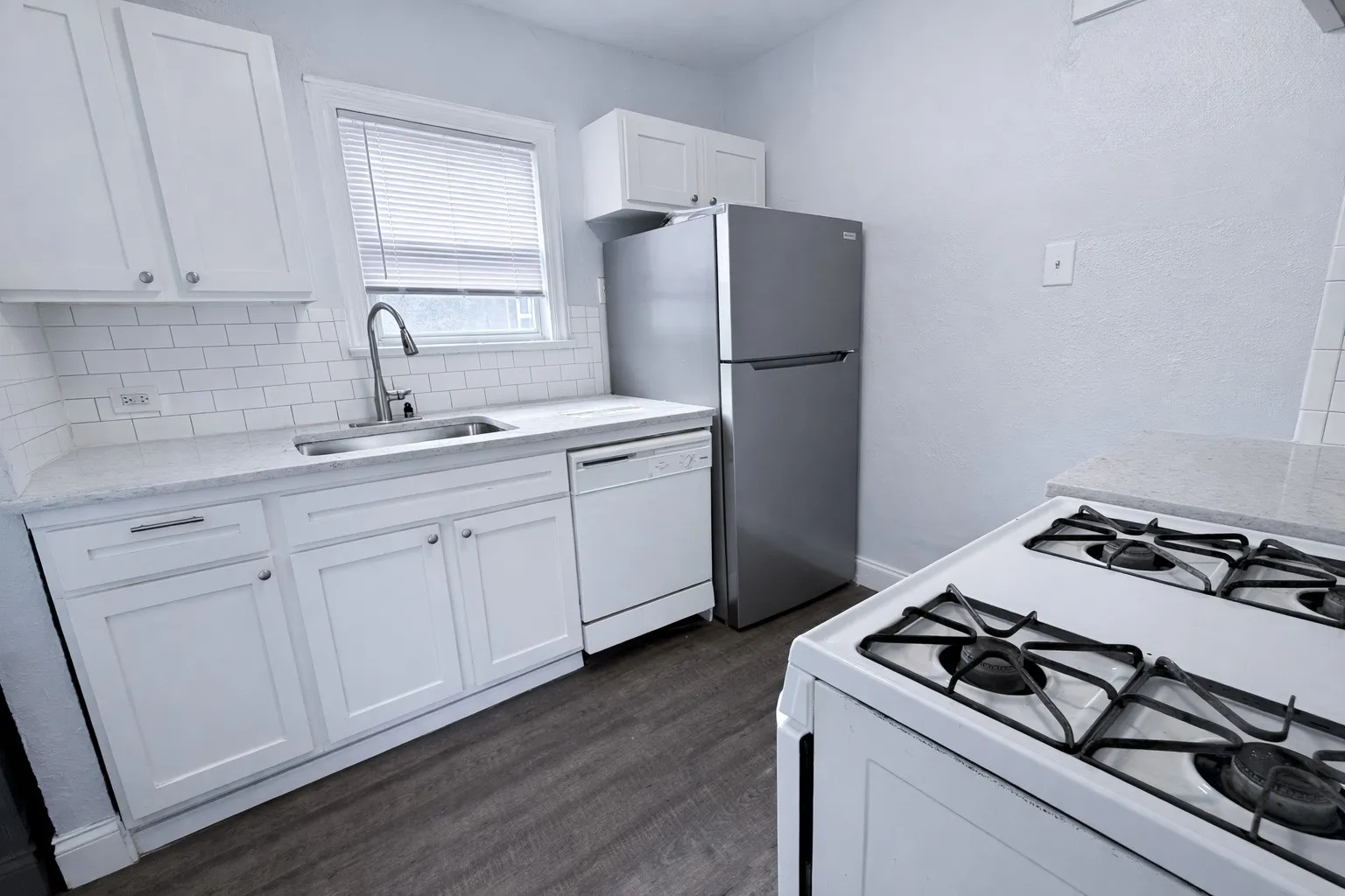 Gas stove and appliances are ready to go.