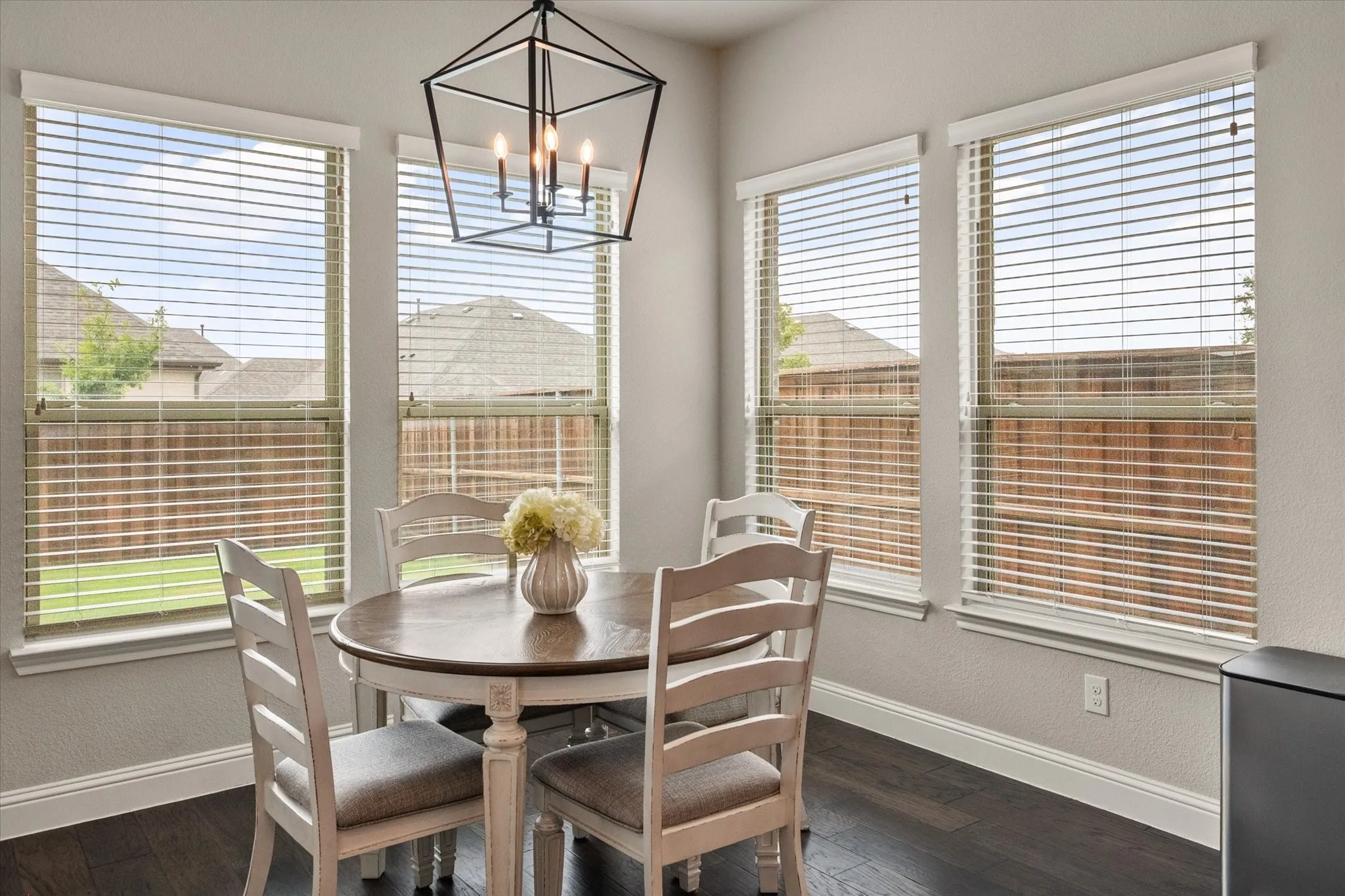 Light filled breakfast nook that walks out onto the covered patio