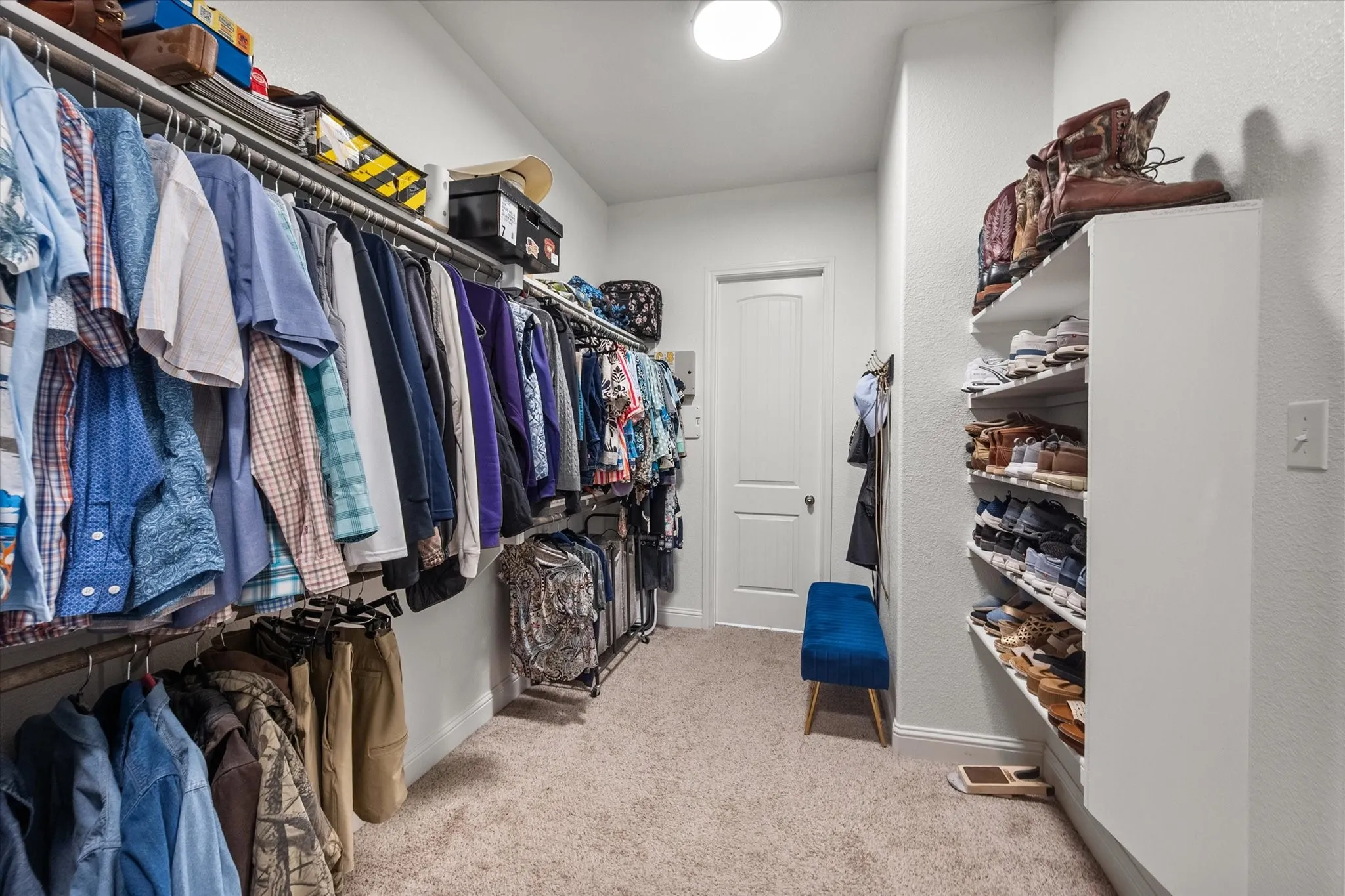 Primary closet that attaches to the oversized laundry room
