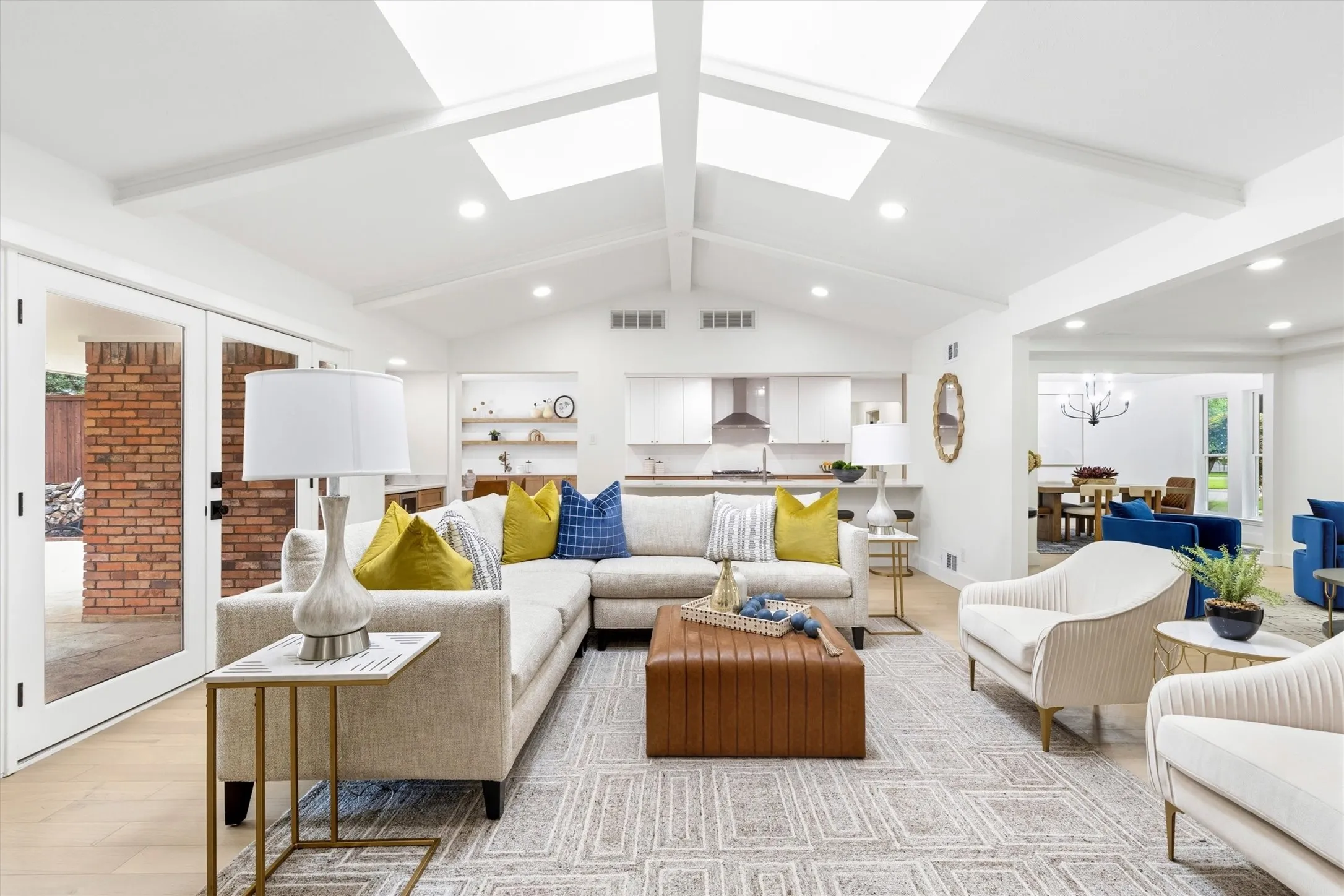 Vaulted ceiling with skylights and recessed lighting