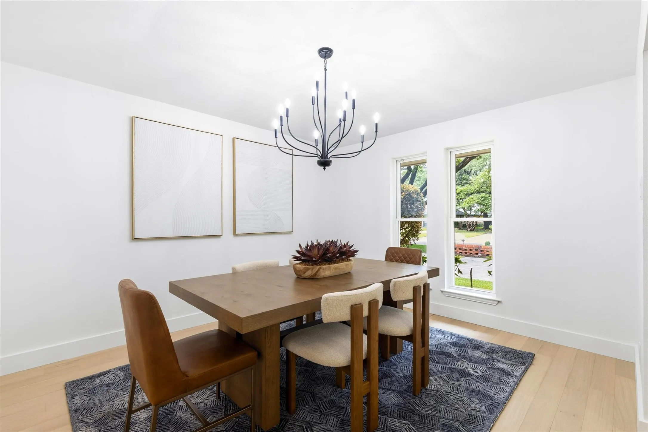 White walls with light wood-finish flooring