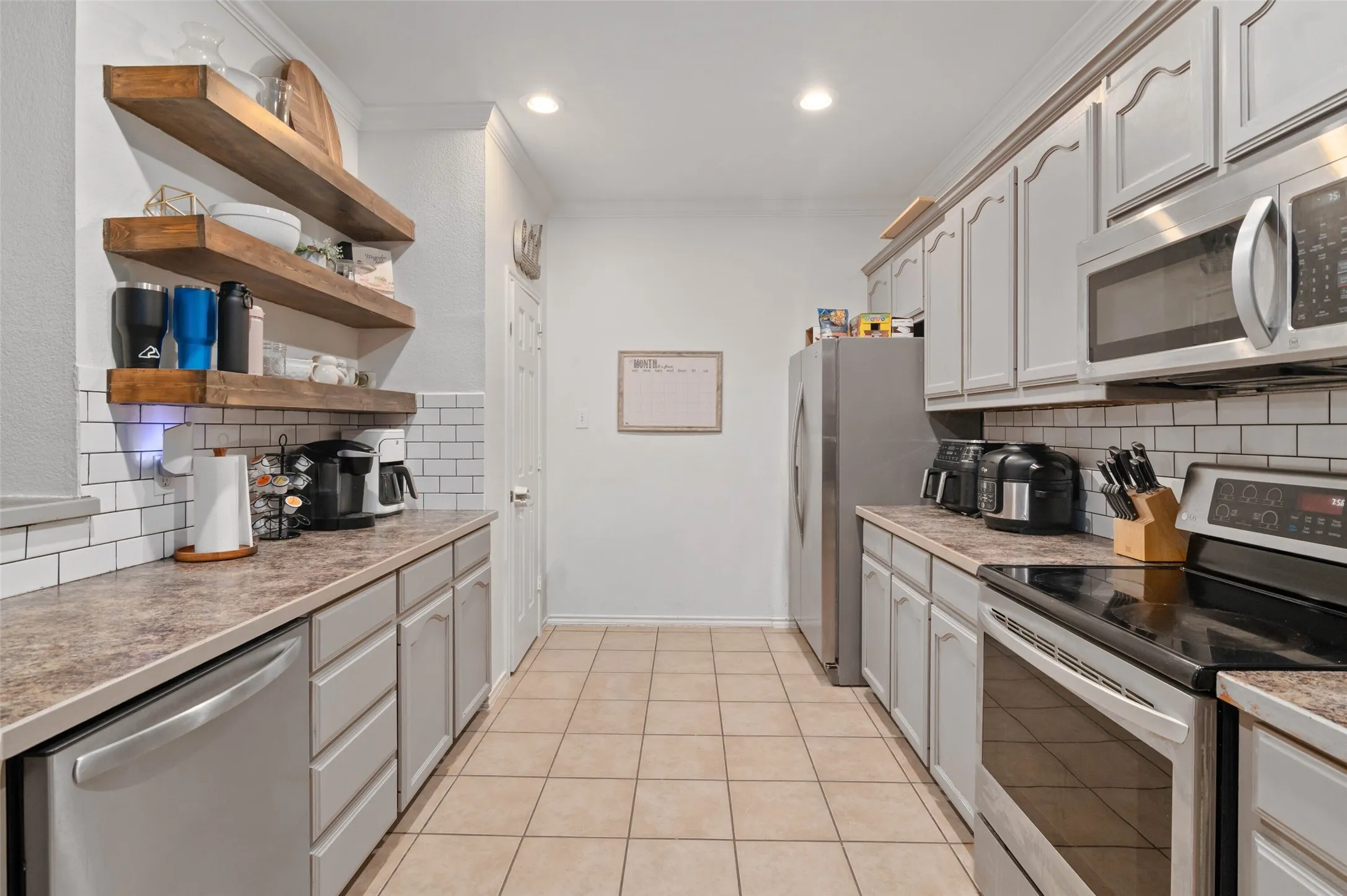 Galley kitchen with pantry