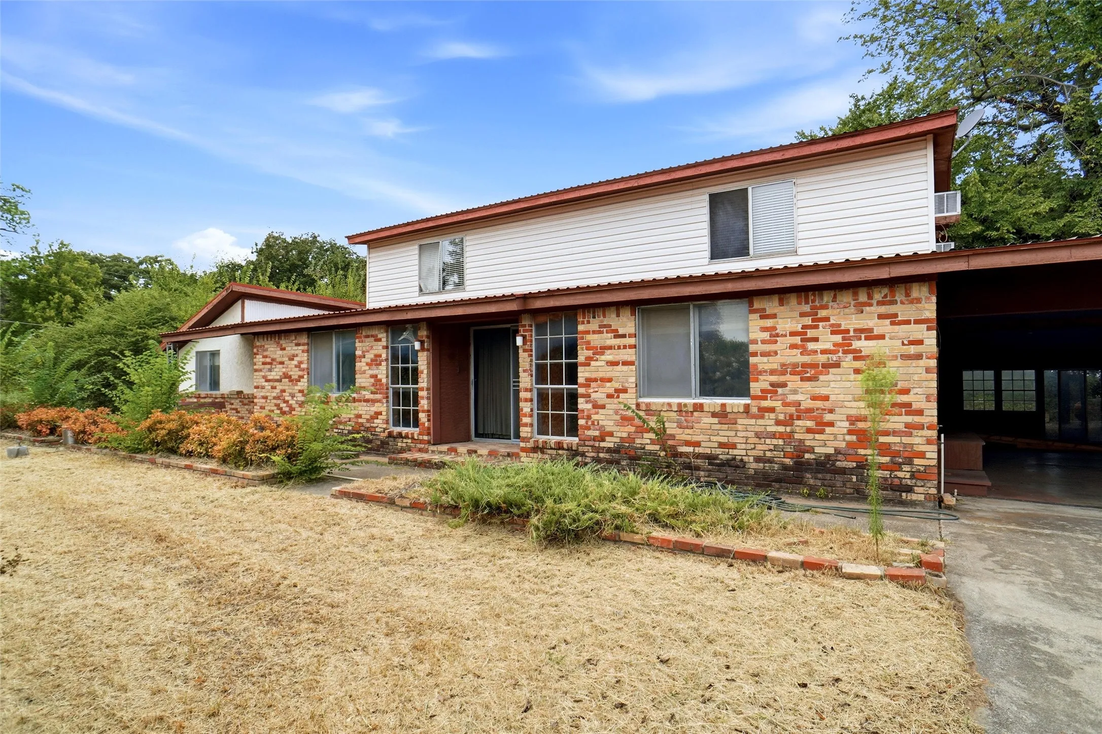 Another Angle of Home Which Opens to Carport