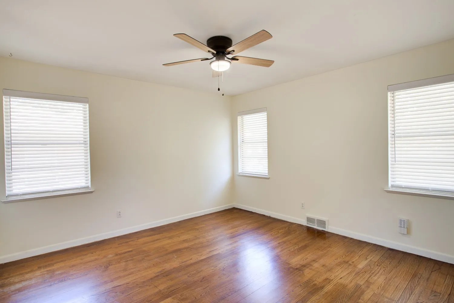 Back bedroom with windows looking into backyard