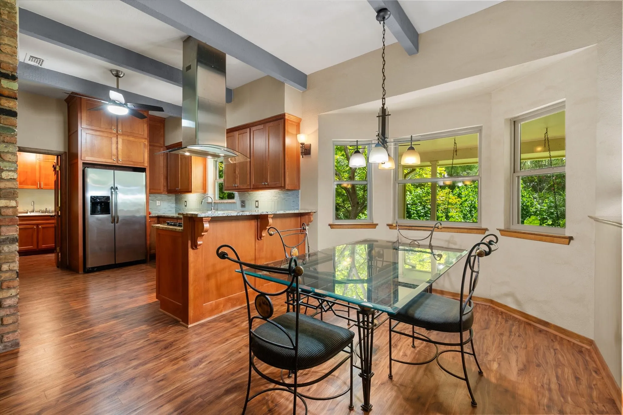 Breakfast area has a bow window looking out to the backyard too!