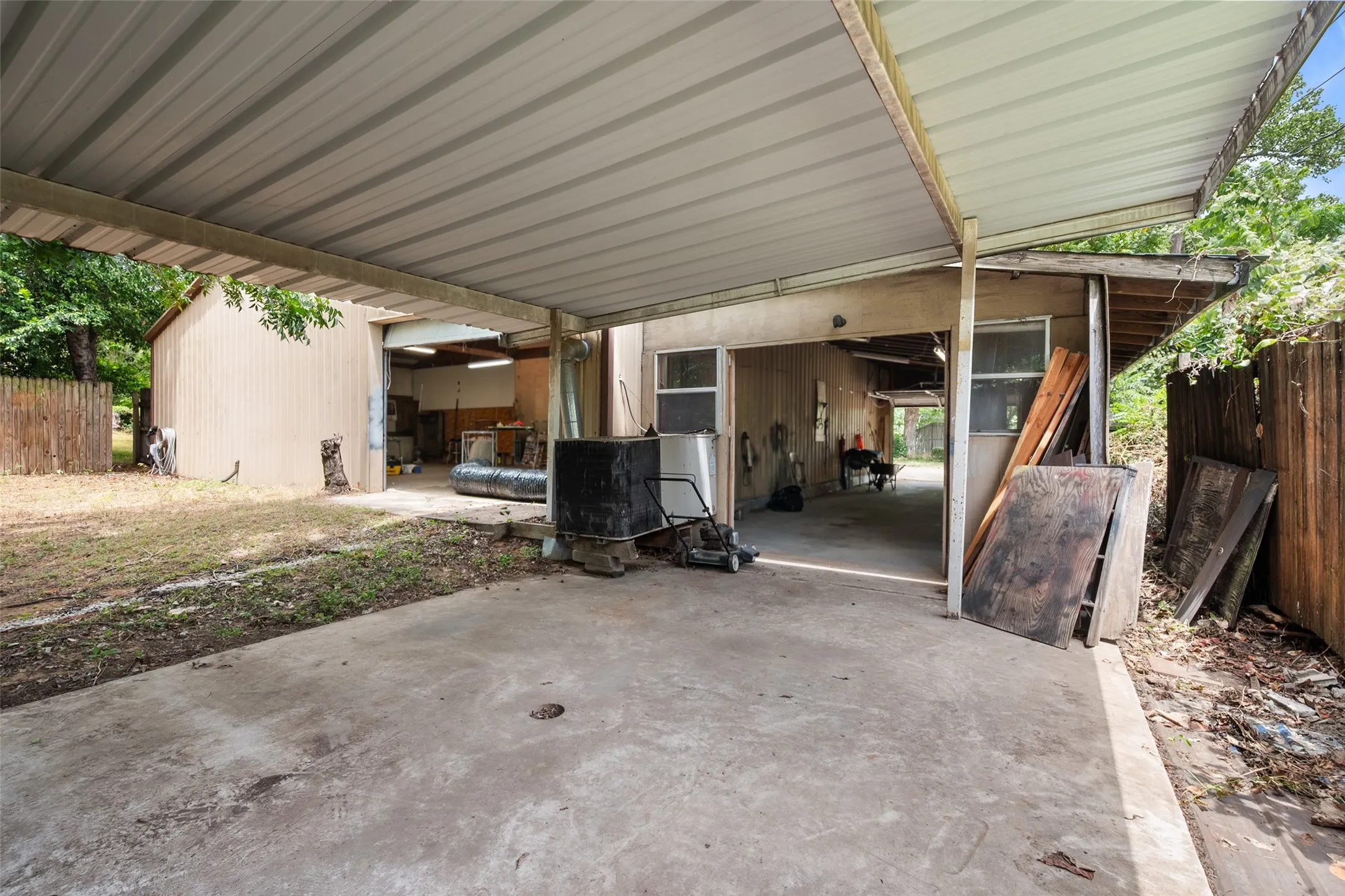 View from this covered area looking back towards the shop and workspace addition.