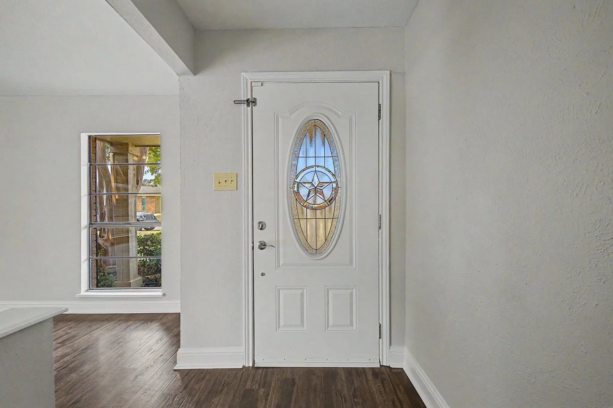 When you enter the home, the gorgeous wood-plank tile floors seamlessly flow throughout the entire home.
