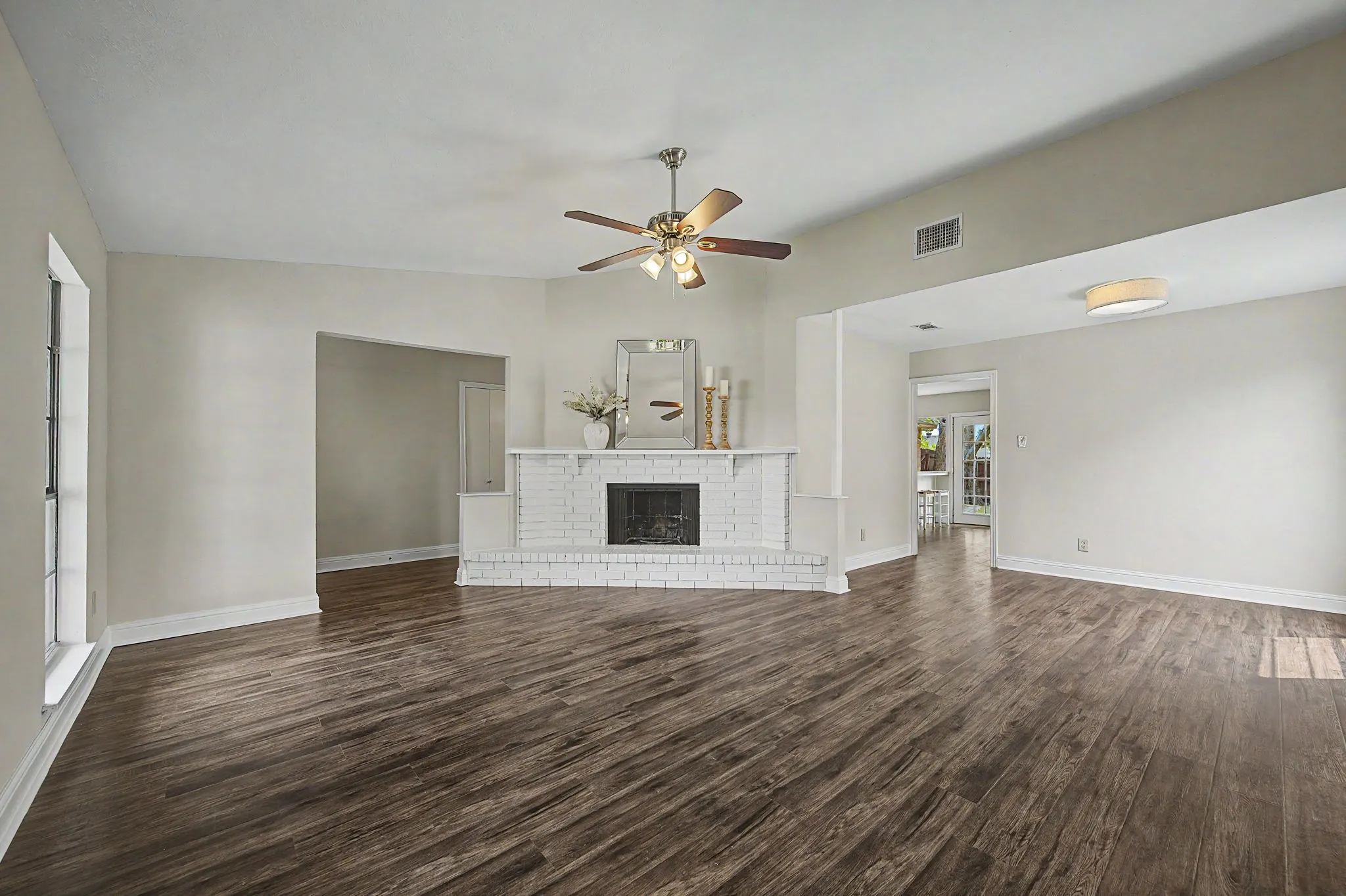 Right off the front entry is a spacious living room with a wood burning fireplace.
