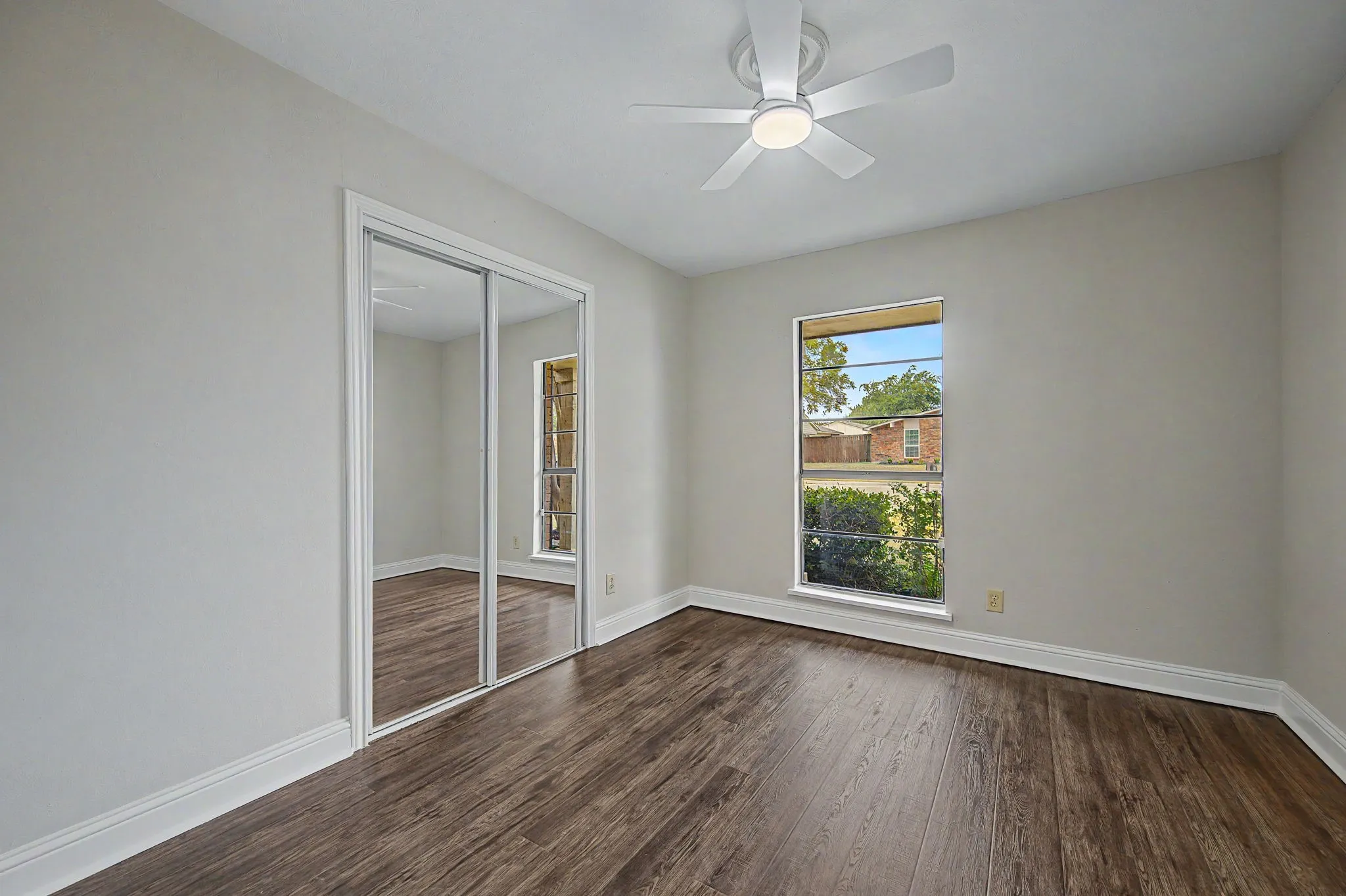 Great size secondary bedroom with ceiling fan.
