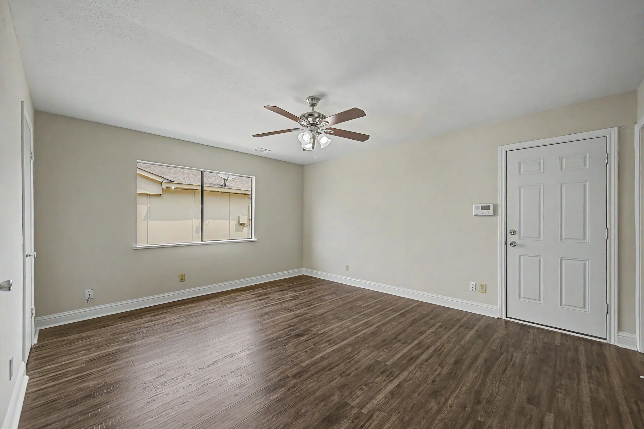 Great size primary bedroom with his and hers walk-in closets and ensuite bathroom.