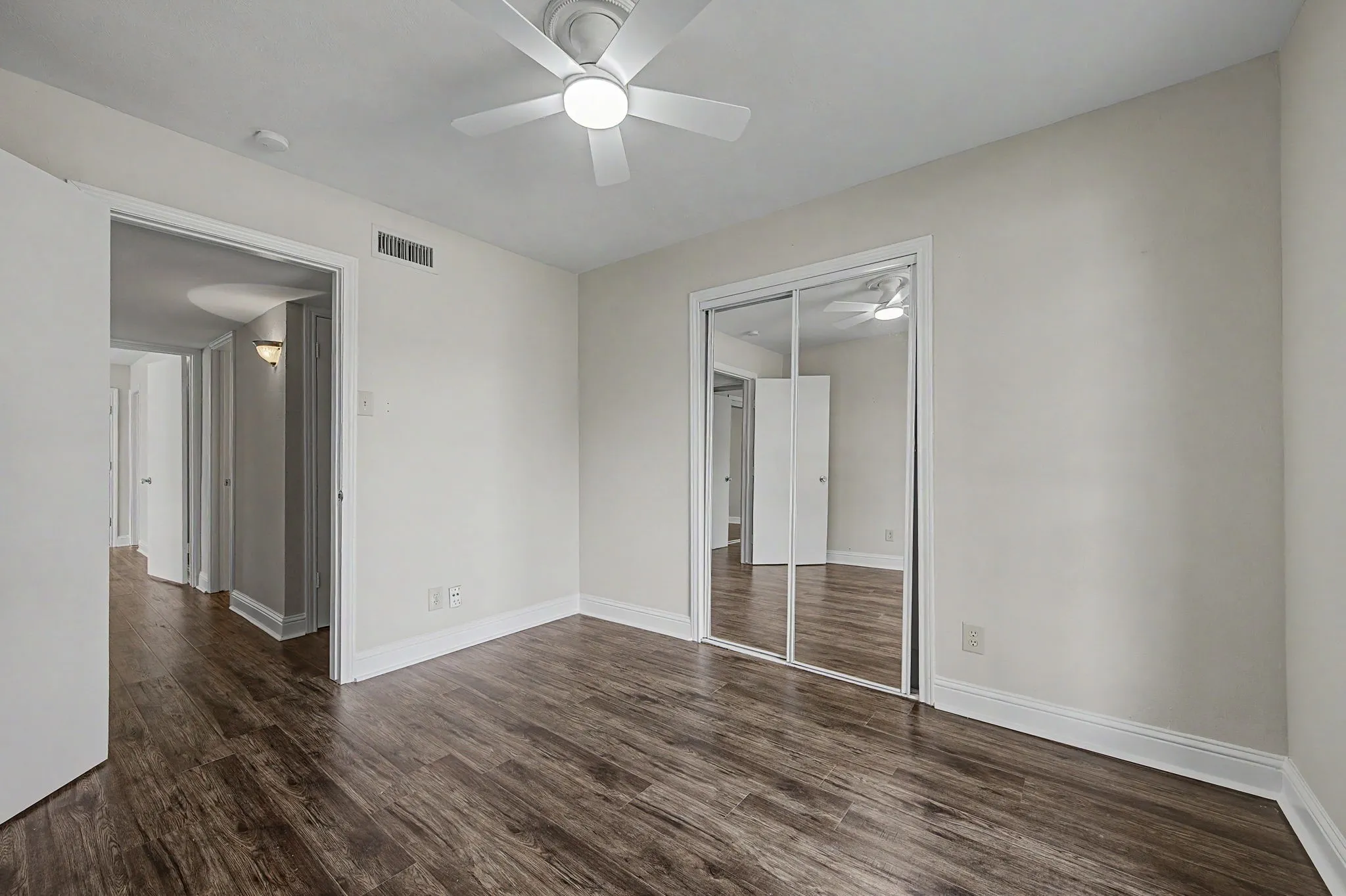 Great size secondary bedroom with ceiling fan.
