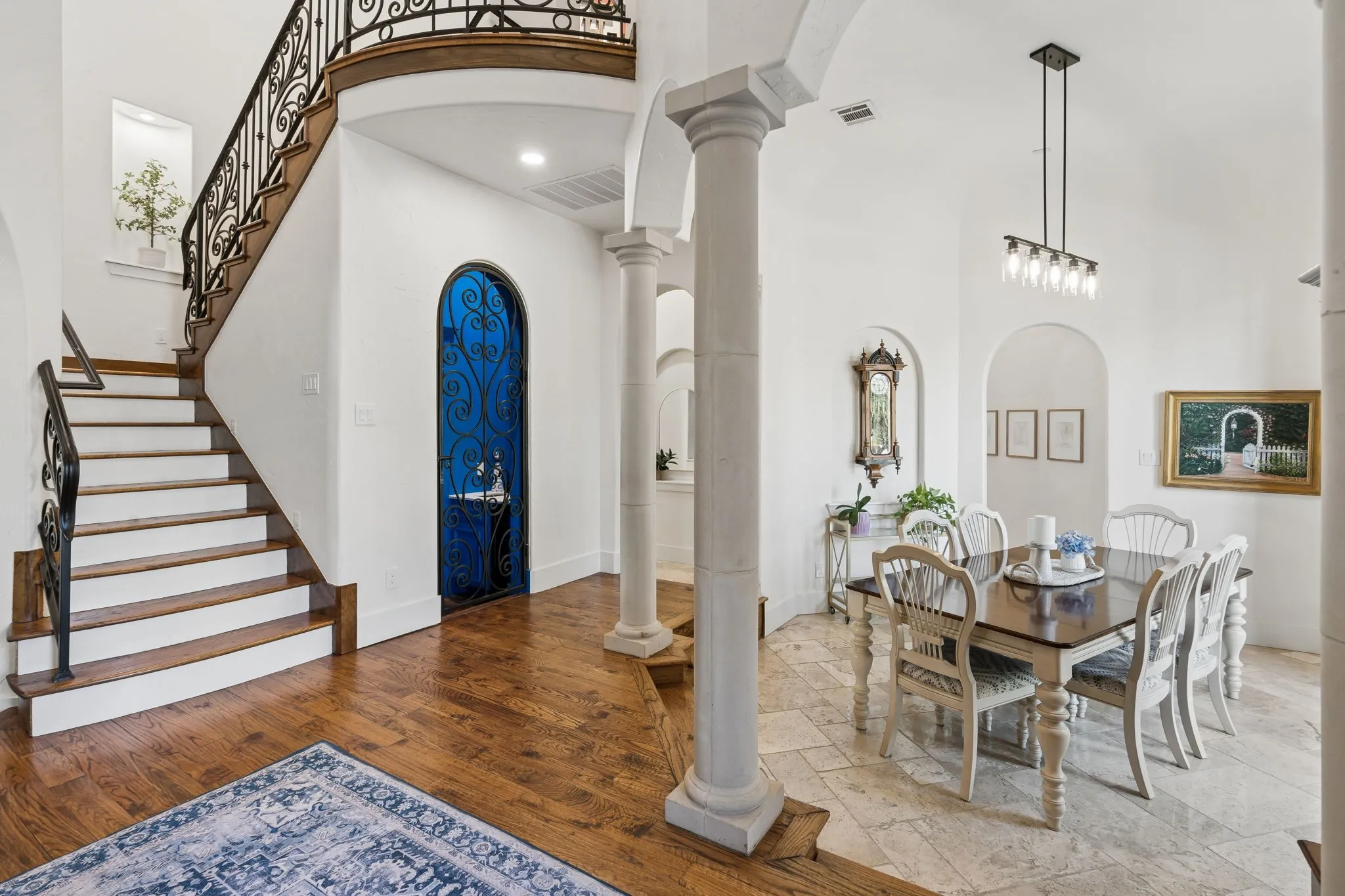 Grand entrance with soaring ceilings showcasing excellent craftsmanship